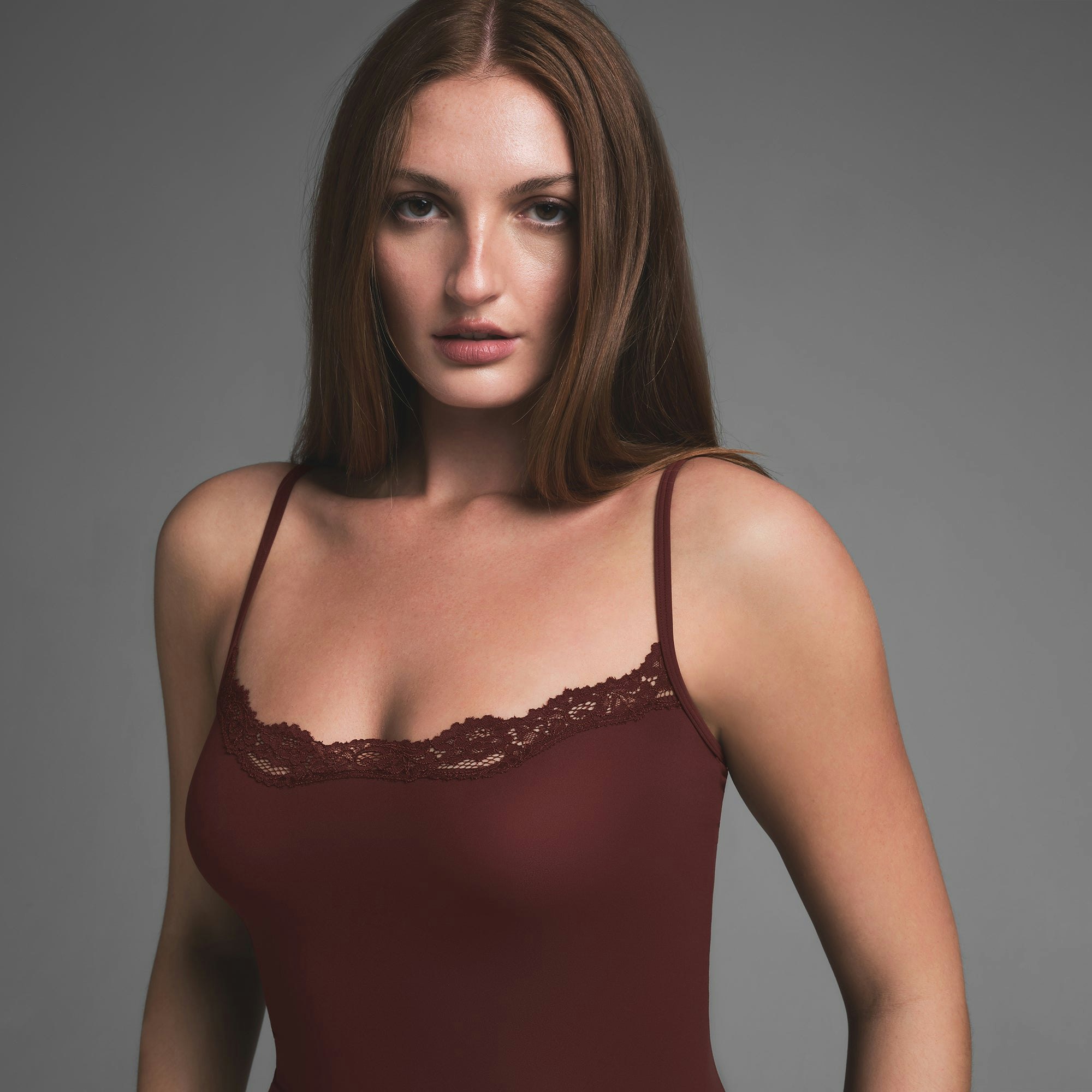 FITS EVERYBODY LACE SLIP DRESS | OXBLOOD ON A MODEL SIDE VIEW