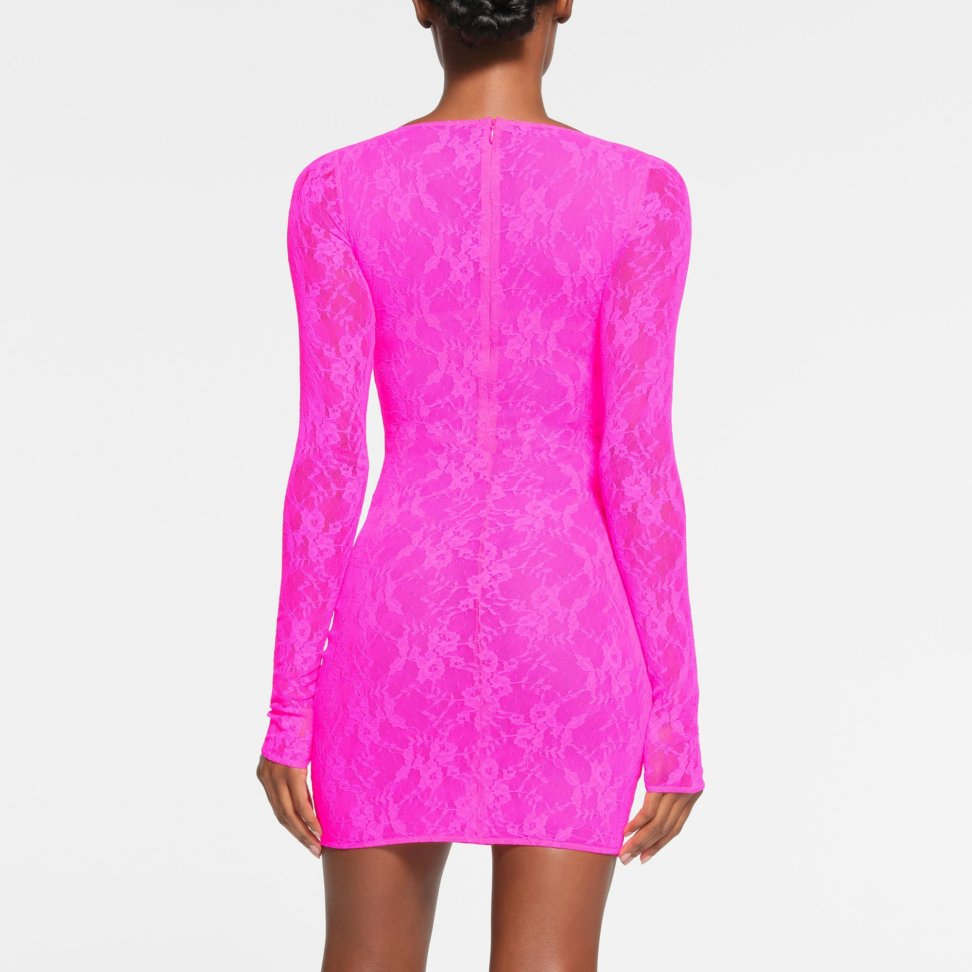 STRETCH LACE LINED LONG SLEEVE UNDERWIRE DRESS | NEON PINK ON A MODEL BACK VIEW
