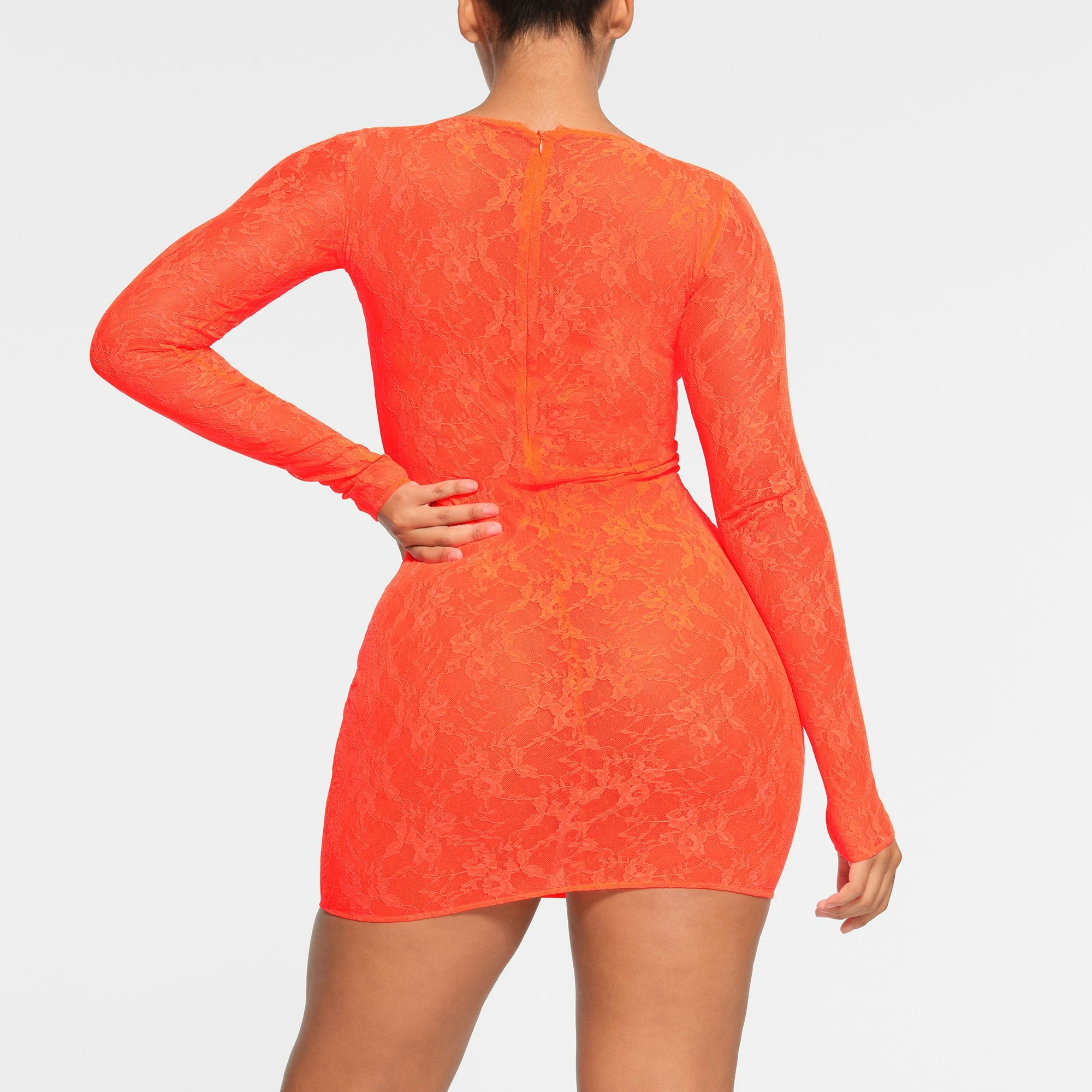 STRETCH LACE LINED LONG SLEEVE UNDERWIRE DRESS | SUNSET ON A MODEL BACK VIEW