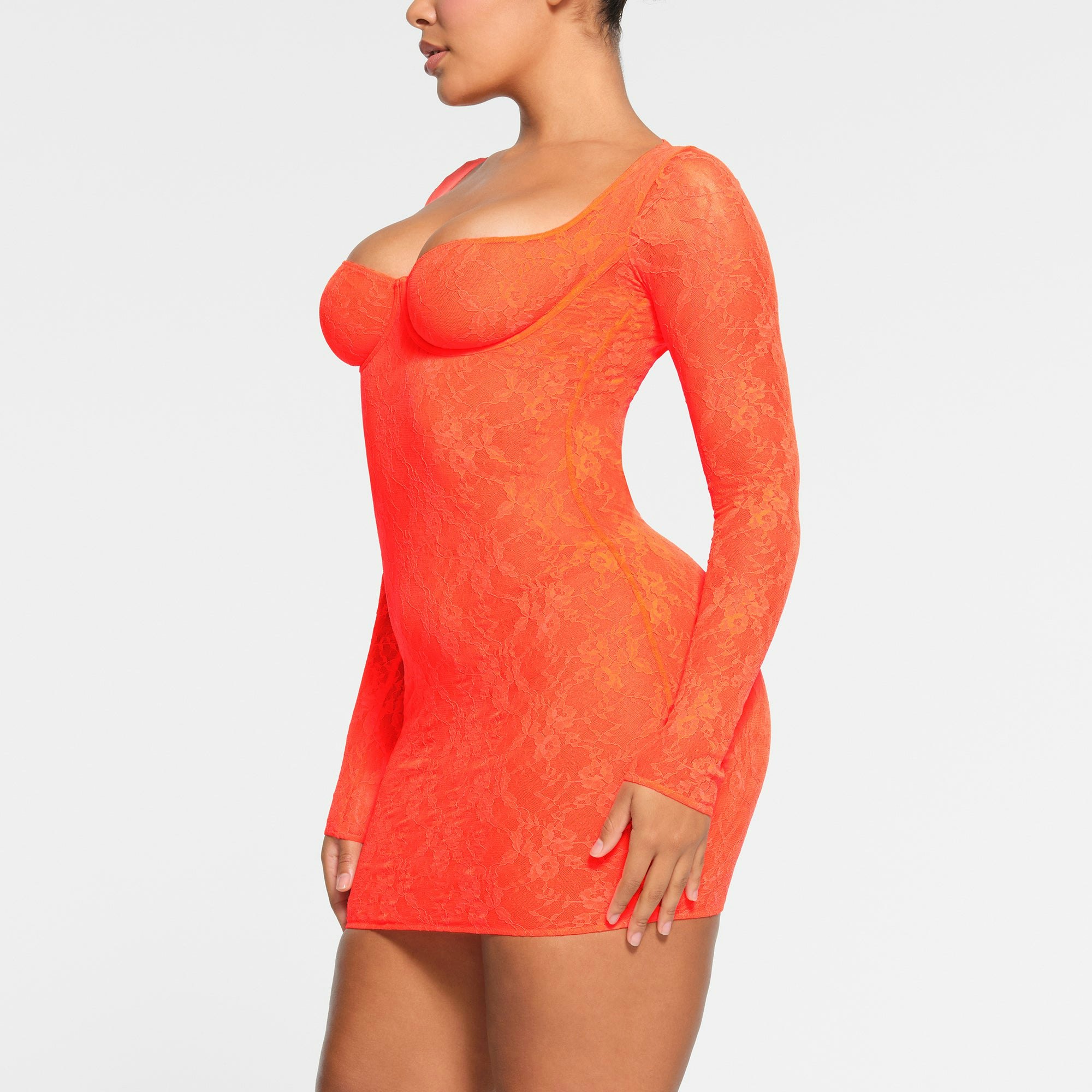 STRETCH LACE LINED LONG SLEEVE UNDERWIRE DRESS | SUNSET ON A MODEL SIDE VIEW