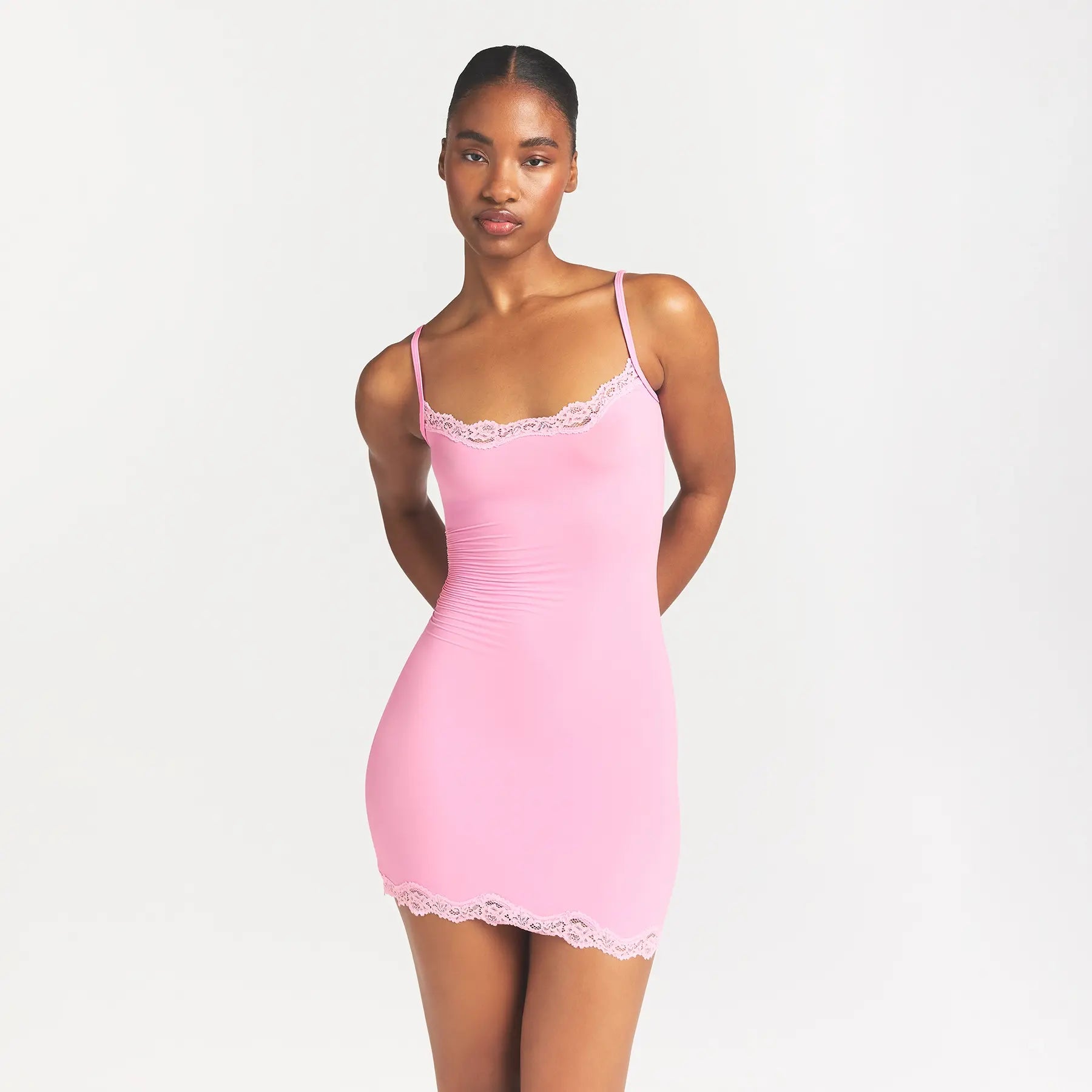 FITS EVERYBODY LACE SLIP DRESS | BUBBLE GUM TONAL ON A MODEL FRONT VIEW @ | FOCUS: 0.0, 1.0, 0.9