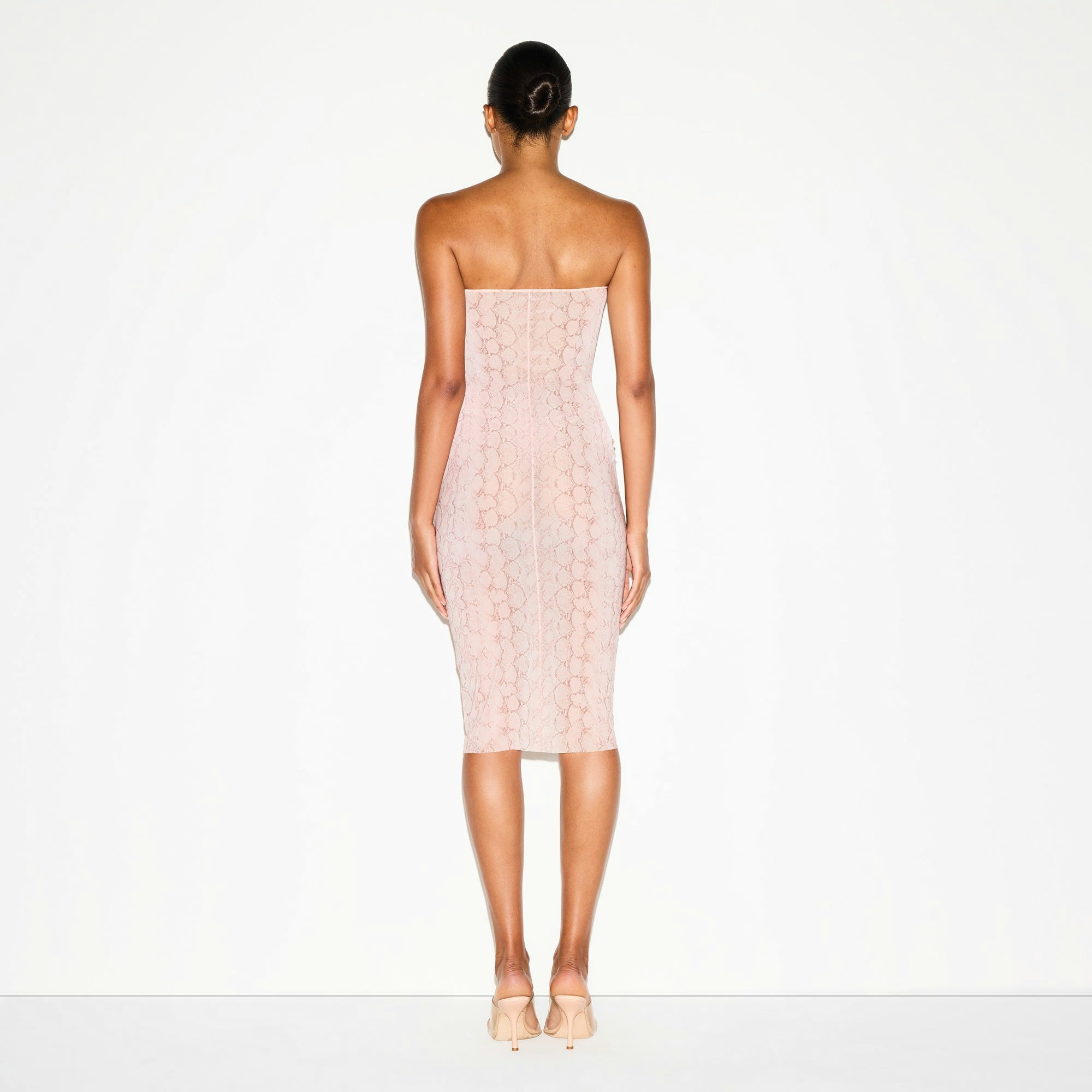 MILKY SHEER MIDI TUBE DRESS | ROSE PASTEL SNAKE PRINT ON A MODEL FRONT VIEW @ | FOCUS: 0.0, 1.0, 0.9