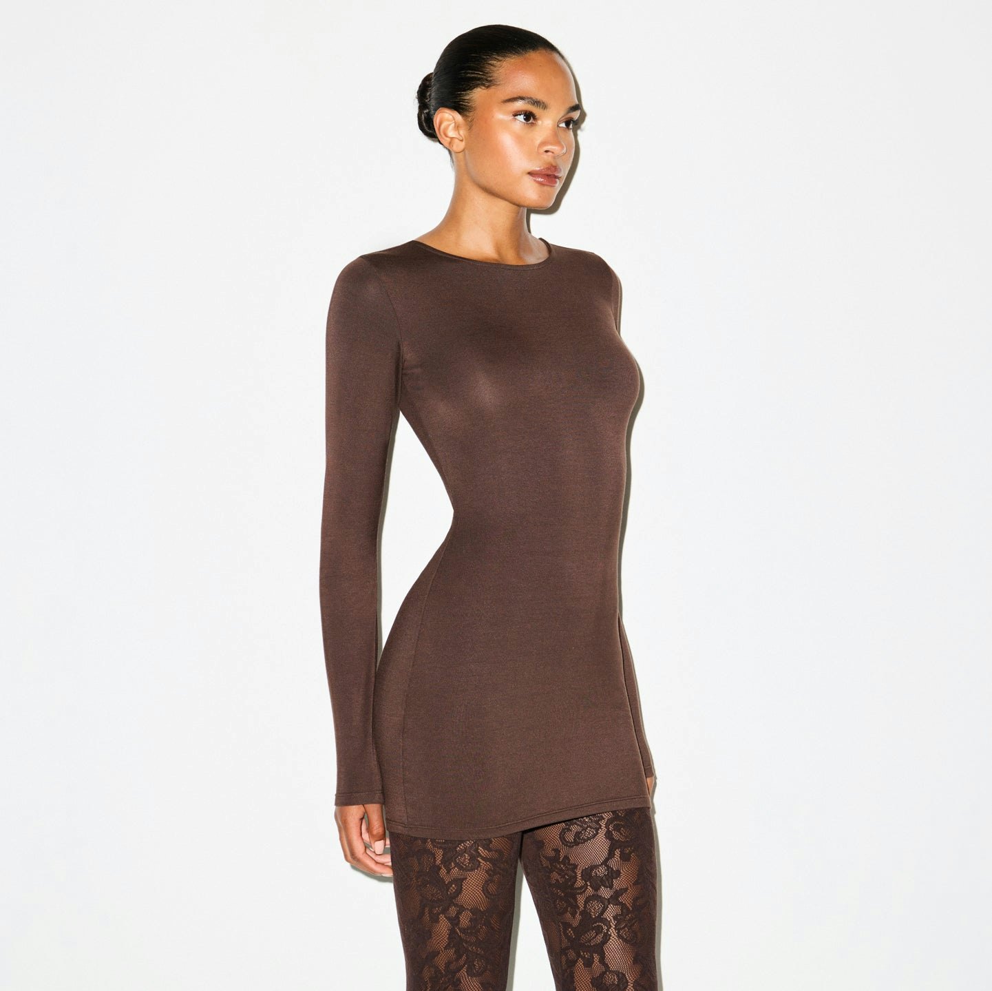 SMOOTH LAYERS CREWNECK MINI DRESS | ESPRESSO ON A MODEL SIDE VIEW @ | FOCUS: 0.0, 1.0, 0.9