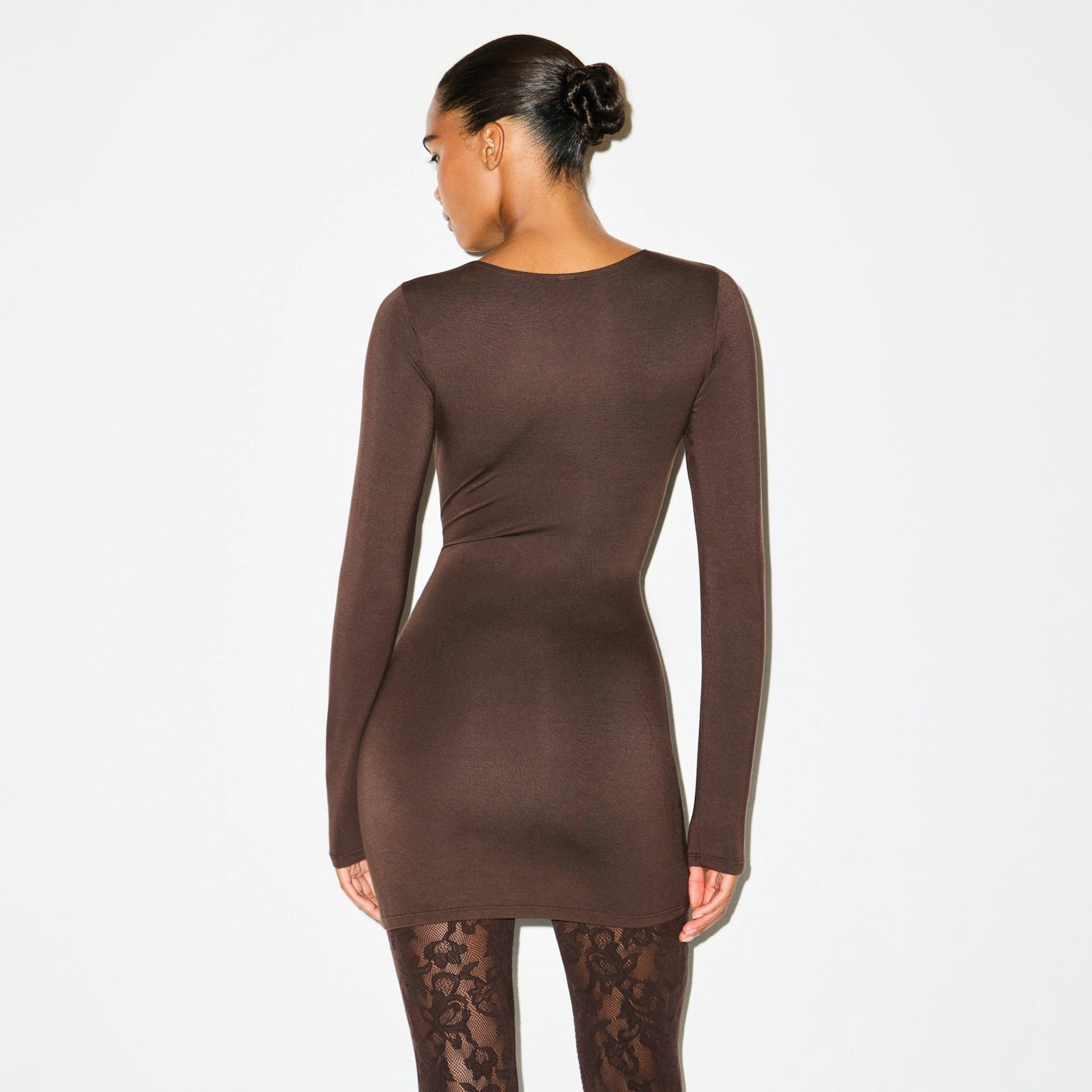 SMOOTH LAYERS CREWNECK MINI DRESS | ESPRESSO ON A MODEL SIDE VIEW @ | FOCUS: 0.0, 1.0, 0.9