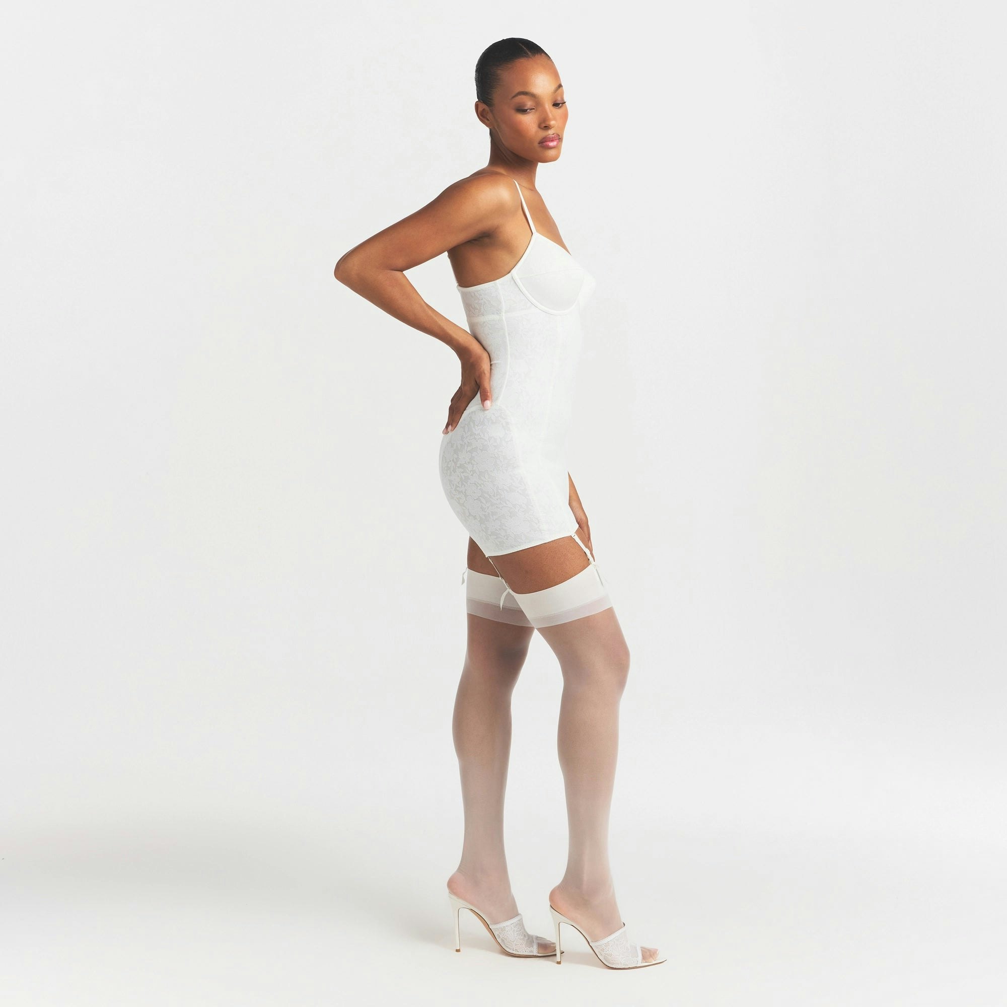 LACE SHAPEWEAR MINI SLIP DRESS | IVORY ON A MODEL FRONT VIEW @ | FOCUS: 0.0, 1.0, 0.9