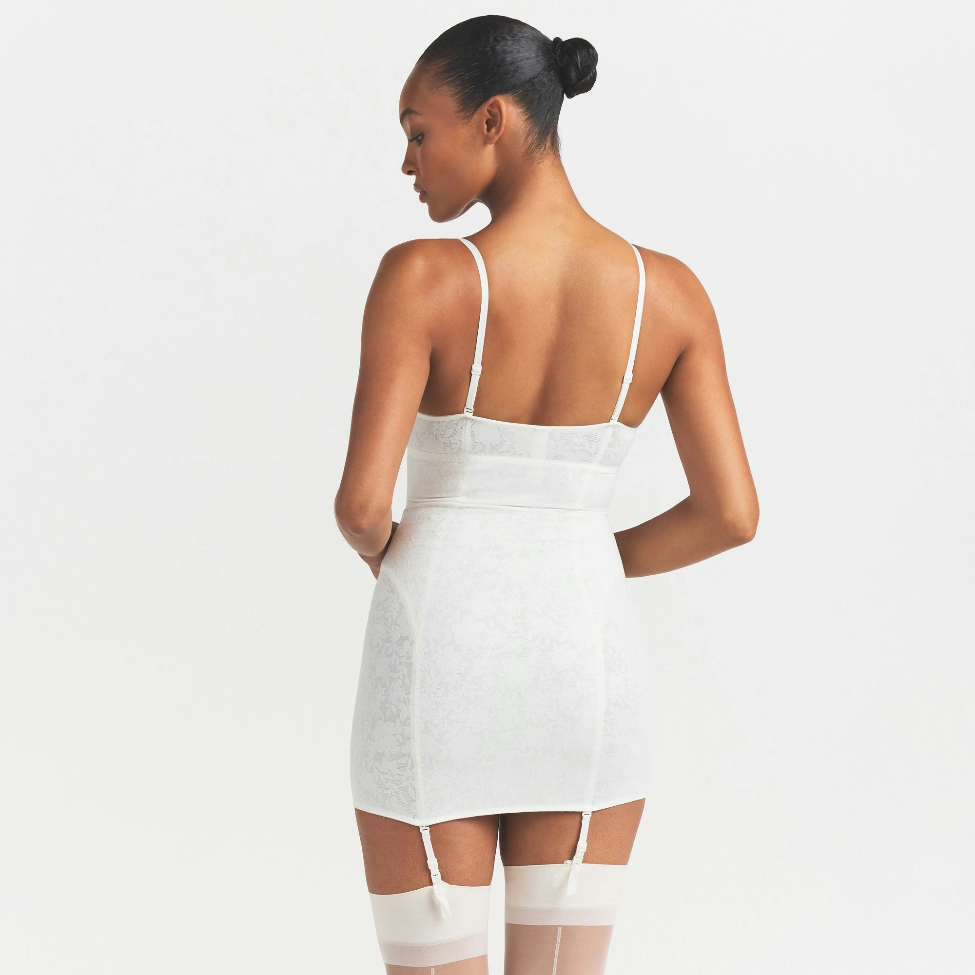 LACE SHAPEWEAR MINI SLIP DRESS | IVORY ON A MODEL SIDE VIEW @ | FOCUS: 0.0, 1.0, 0.9