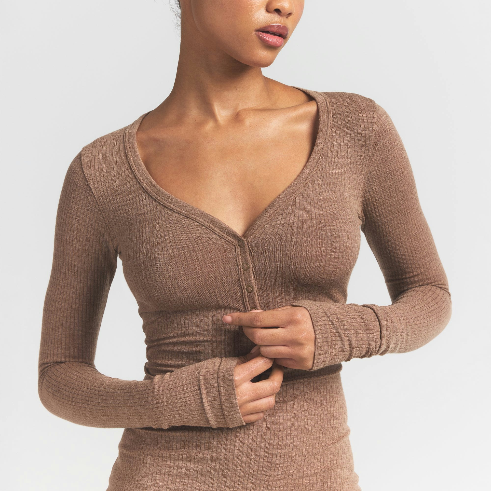 WOOL RIB HENLEY DRESS | SIENNA ON A MODEL FRONT VIEW S | FOCUS: 0.0, 1.0, 0.9