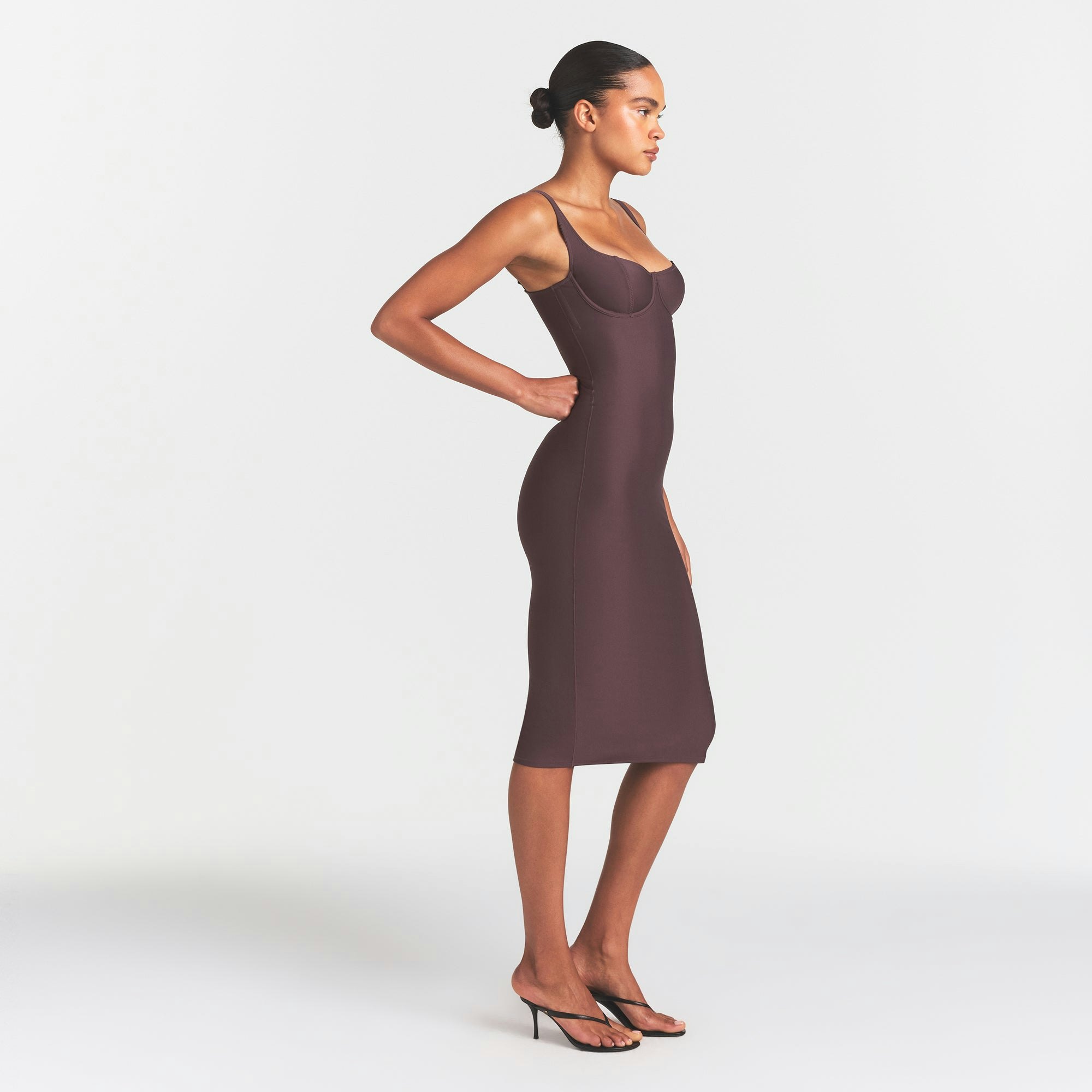 SKIMS BODY MIDI DRESS | RAISIN ON A MODEL FRONT VIEW @ | FOCUS: 0.0, 1.0, 0.9