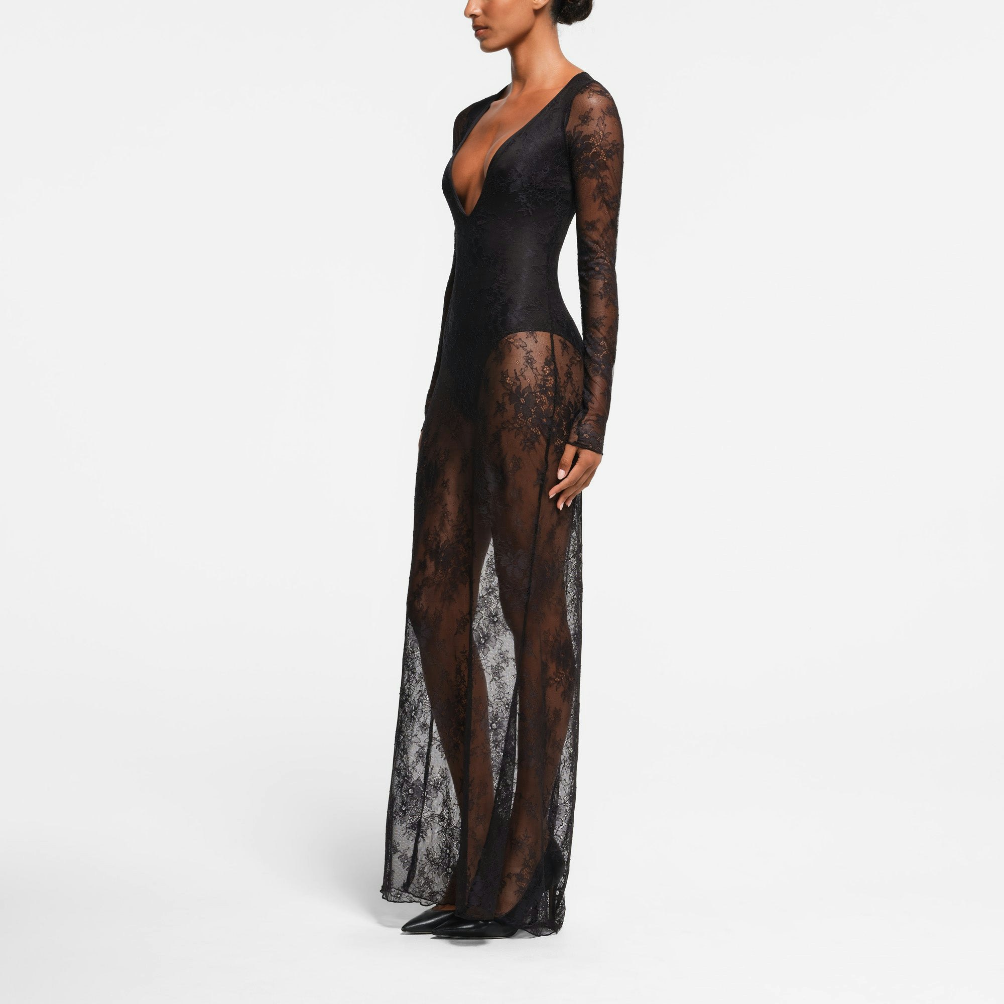 ULTRA FINE LACE PLUNGE LONG DRESS | ONYX ON A MODEL SIDE VIEW