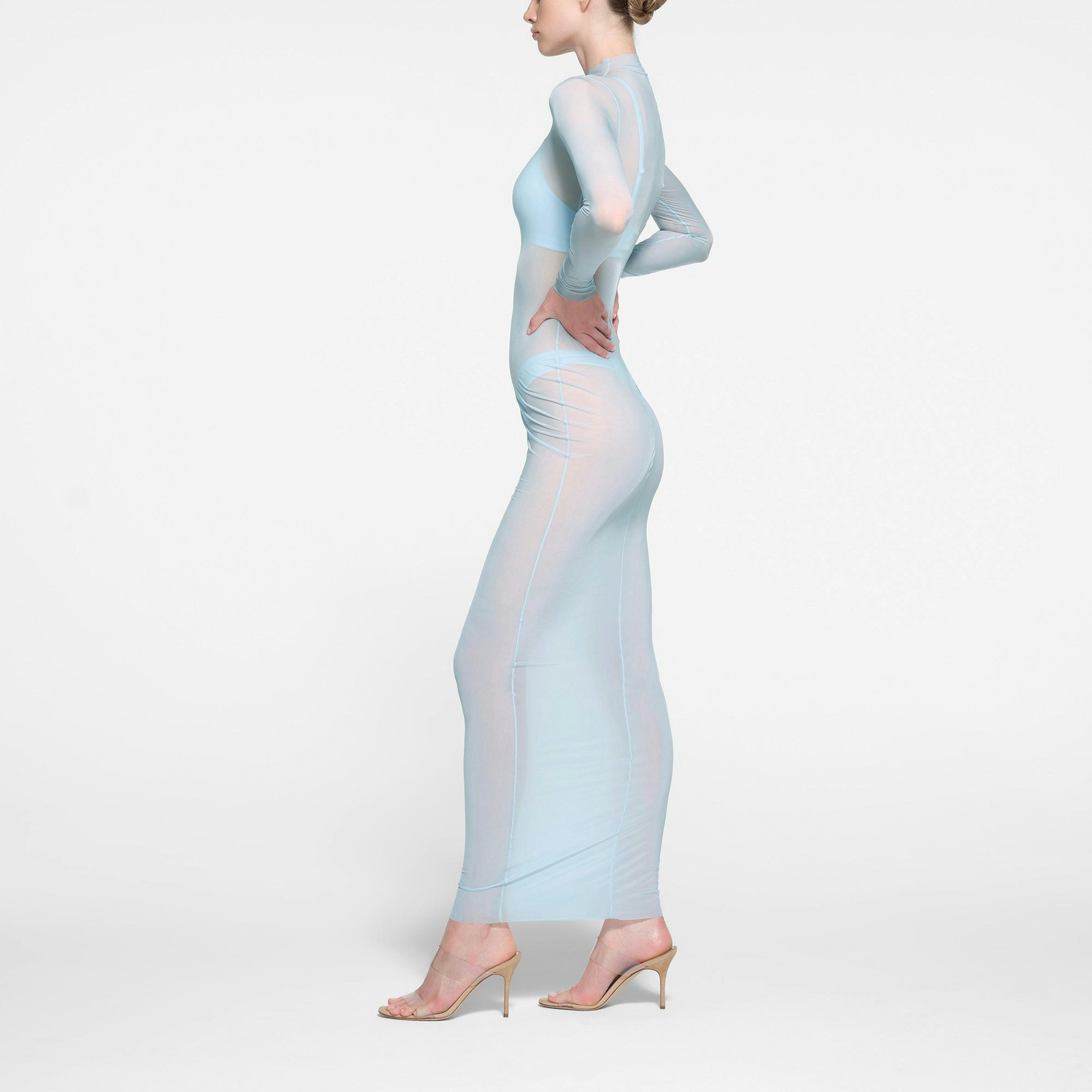 MILKY SHEER MOCK NECK LONG SLEEVE LONG DRESS | OPAL ON A MODEL SIDE VIEW