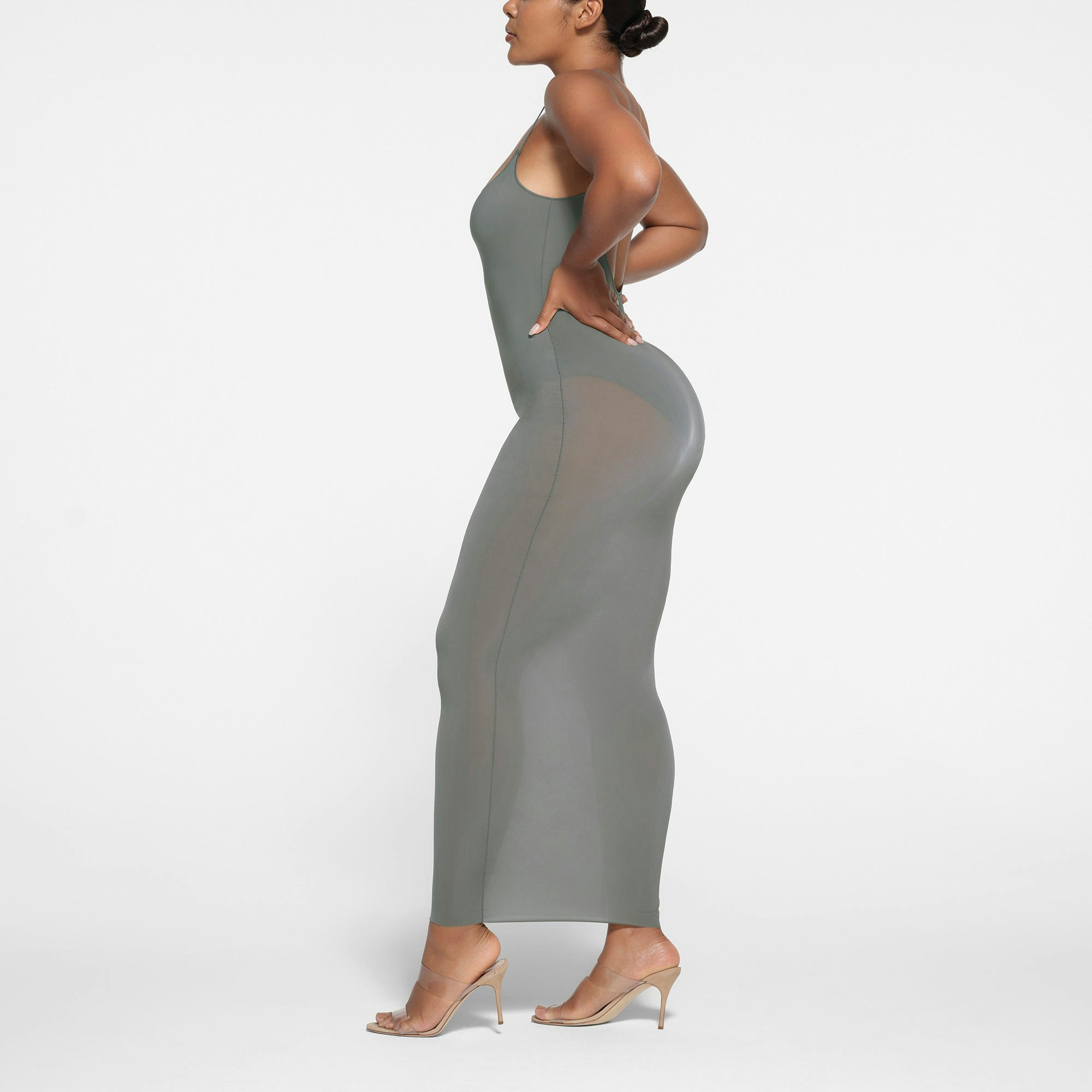 MILKY SHEER LOW BACK SLEEVELESS LONG DRESS | GUNMETAL ON A MODEL SIDE VIEW
