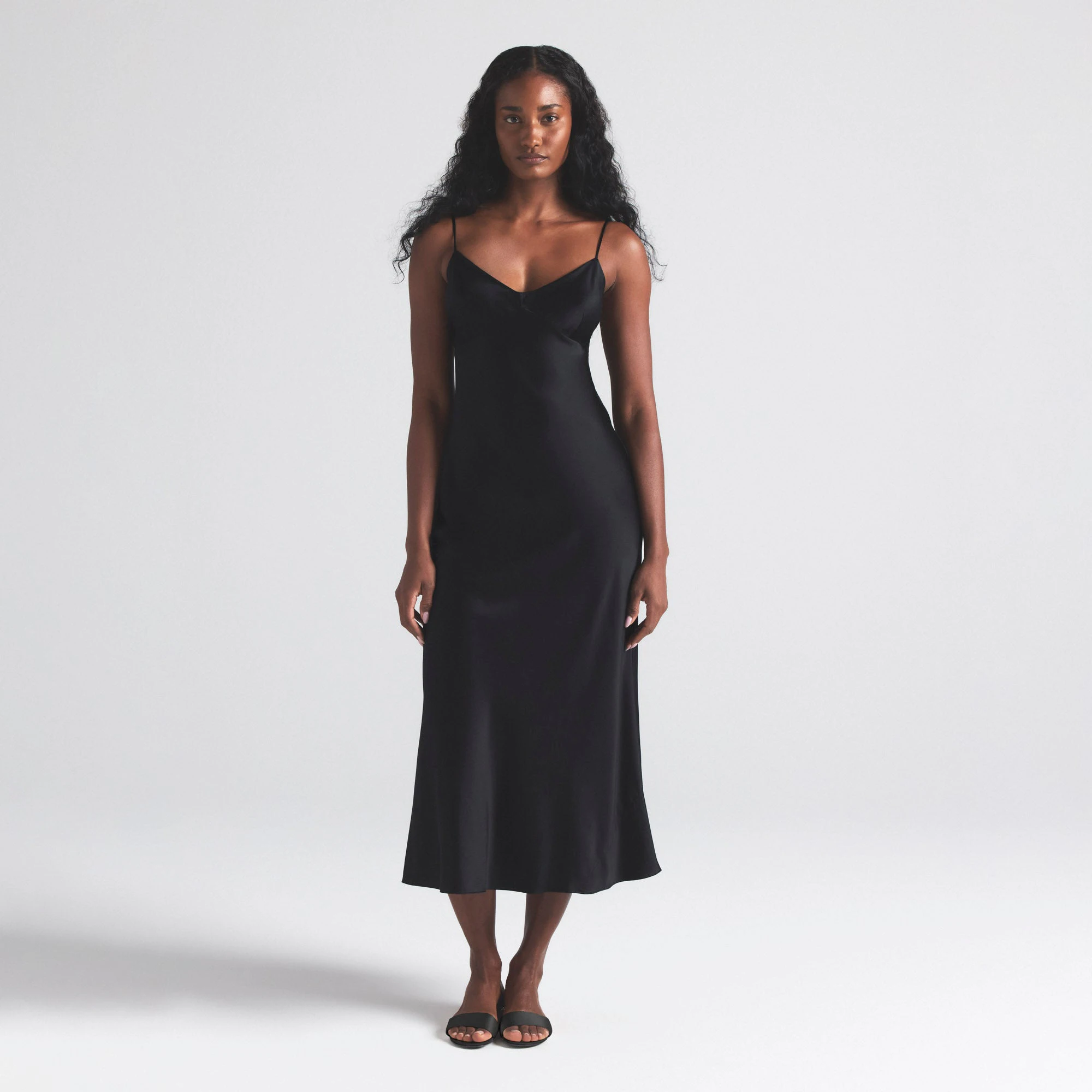 SILK CAMI V NECK LONG SLIP | ONYX ON A MODEL FRONT  ON A MODEL FRONT VIEW | FOCUS: 0.0, 1.0, 0.9