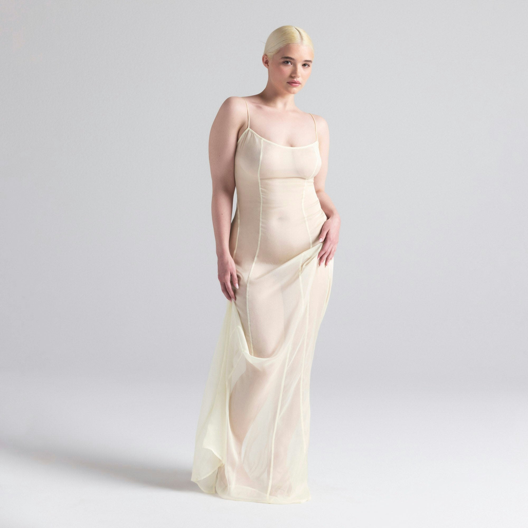 SKIMS ROMANCE LONG SLIP DRESS | IVORY ON A MODEL FRONT  ON A MODEL FRONT VIEW | FOCUS: 0.0, 1.0, 0.9
