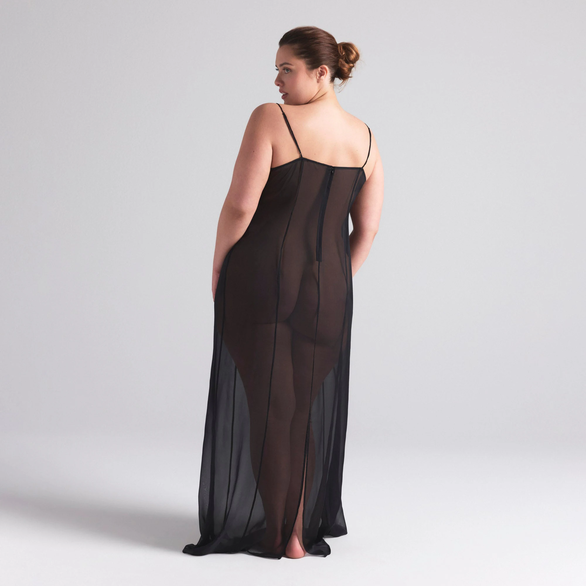 SKIMS ROMANCE LONG SLIP DRESS | ONYX ON A MODEL SIDE  ON A MODEL FRONT VIEW | FOCUS: 0.0, 1.0, 0.9