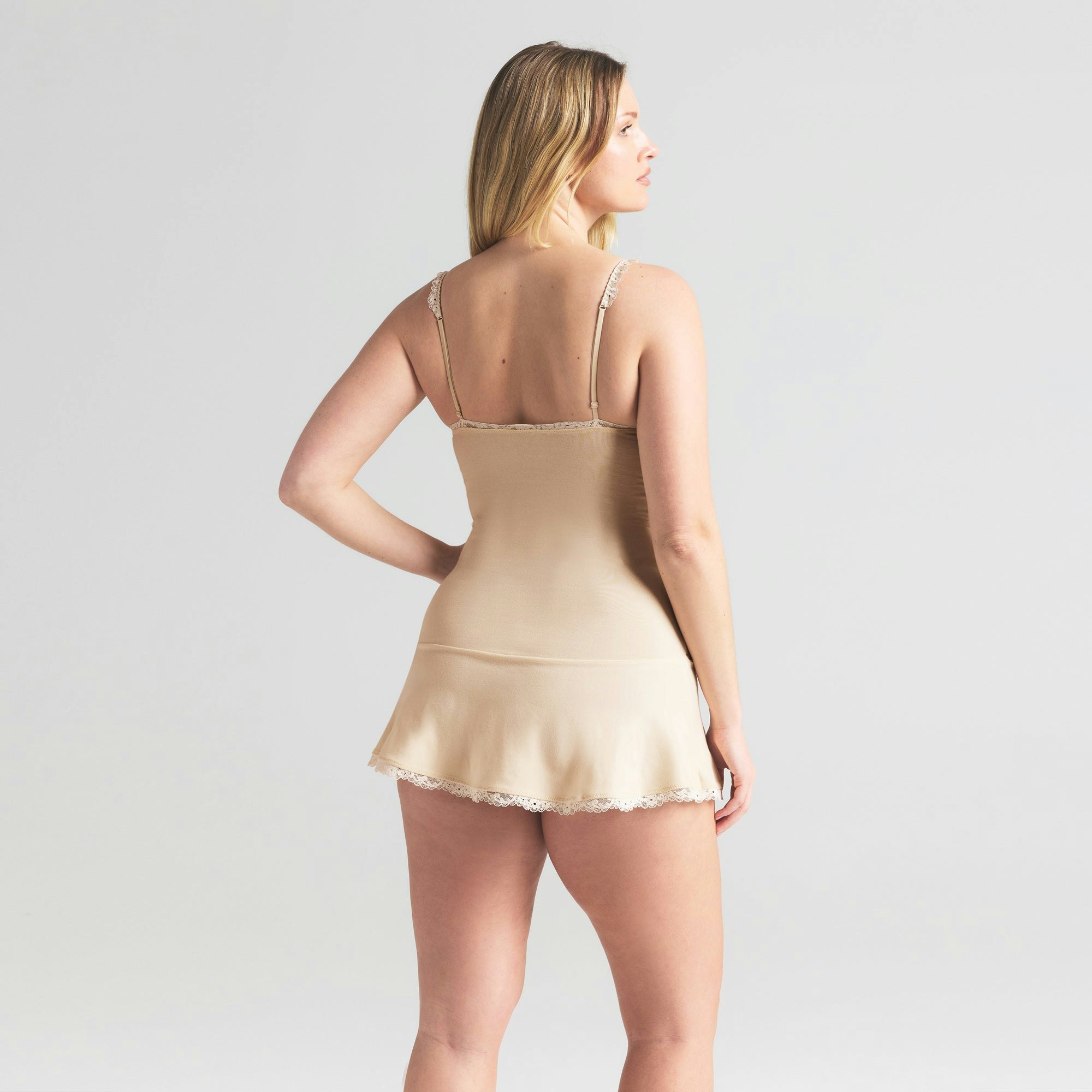 COTTON JERSEY LACE SLIP DRESS | BUTTER ON A MODEL SIDE VIEW | FOCUS: 0.0, 1.0, 0.9