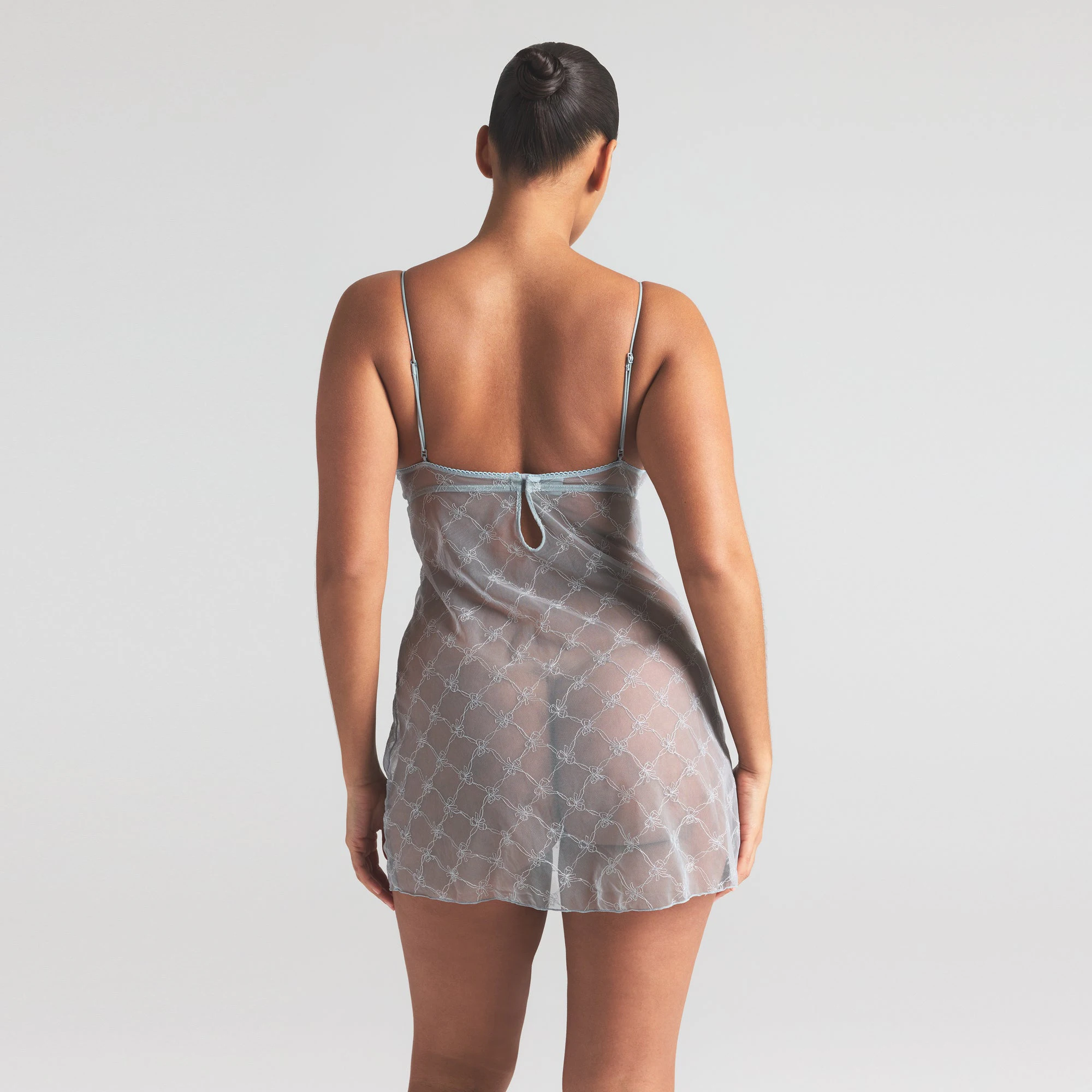 SPRING INTIMATES UNDERWIRE SLIP DRESS | MERCURY BOW TULLE ON A MODEL SIDE VIEW | FOCUS: 0.0, 1.0, 0.9