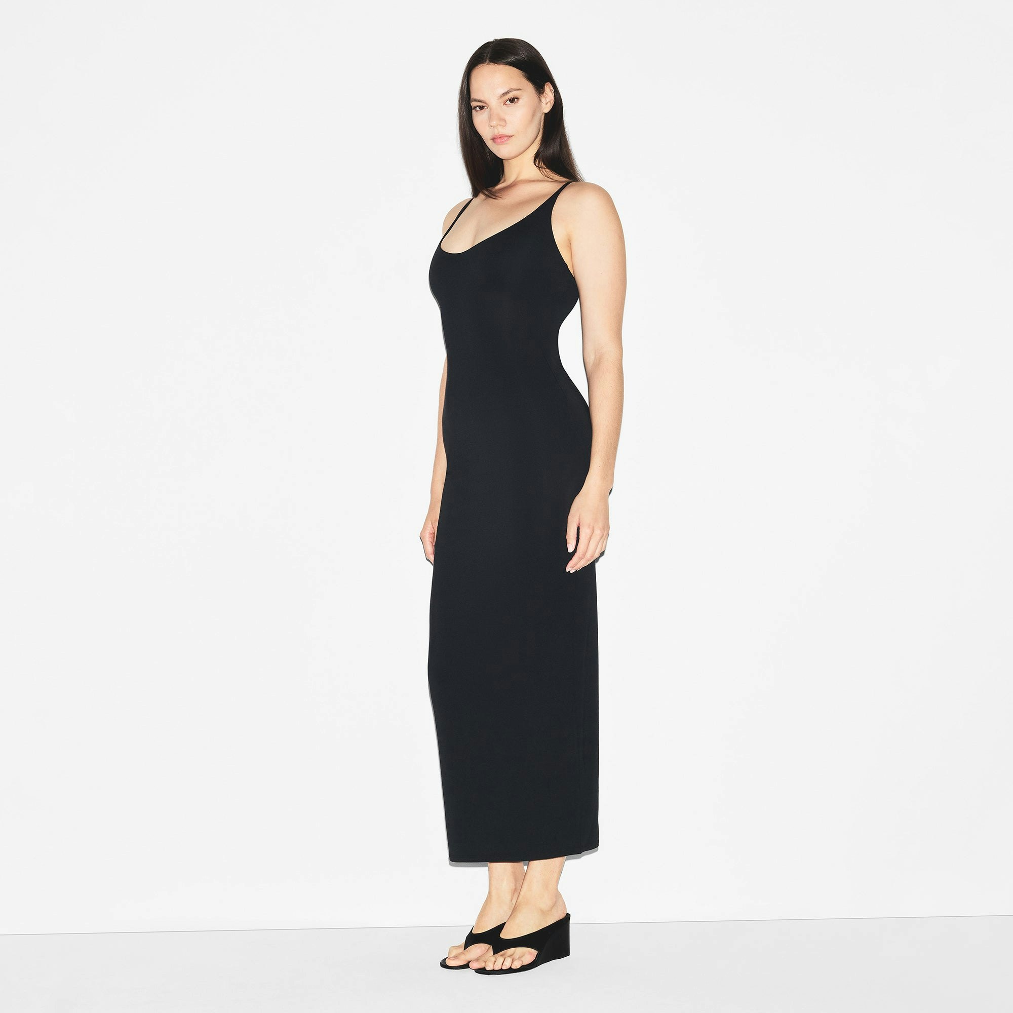 SMOOTH LAYERS SKIMPY SCOOP NECK LONG DRESS | OBSIDIAN ON A MODEL SIDE VIEW | FOCUS: 0.0, 1.0, 0.9