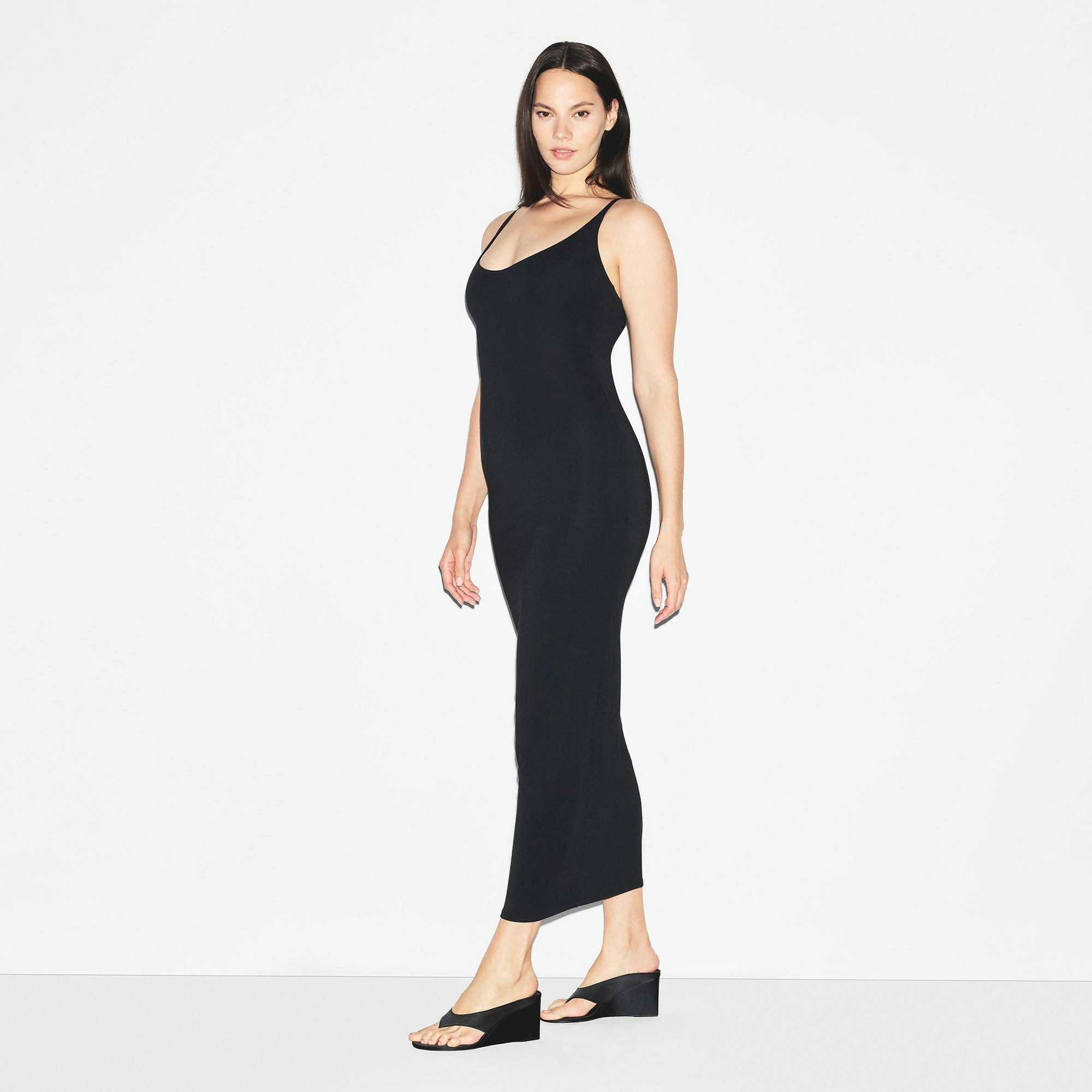 SMOOTH LAYERS SKIMPY SCOOP NECK LONG DRESS | OBSIDIAN ON A MODEL SIDE VIEW | FOCUS: 0.0, 1.0, 0.9