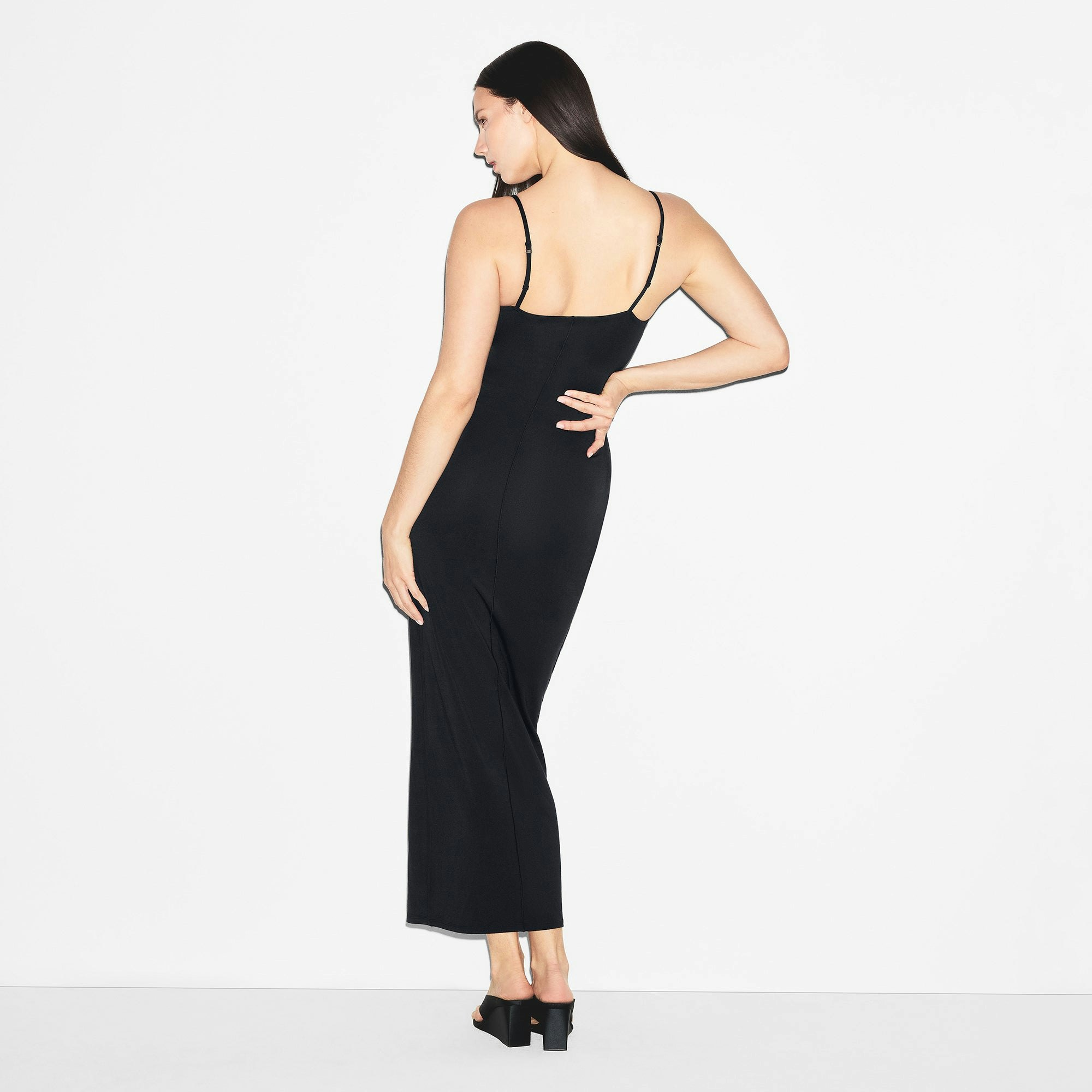 SMOOTH LAYERS SKIMPY SCOOP NECK LONG DRESS | OBSIDIAN ON A MODEL BACK VIEW | FOCUS: 0.0, 1.0, 0.9