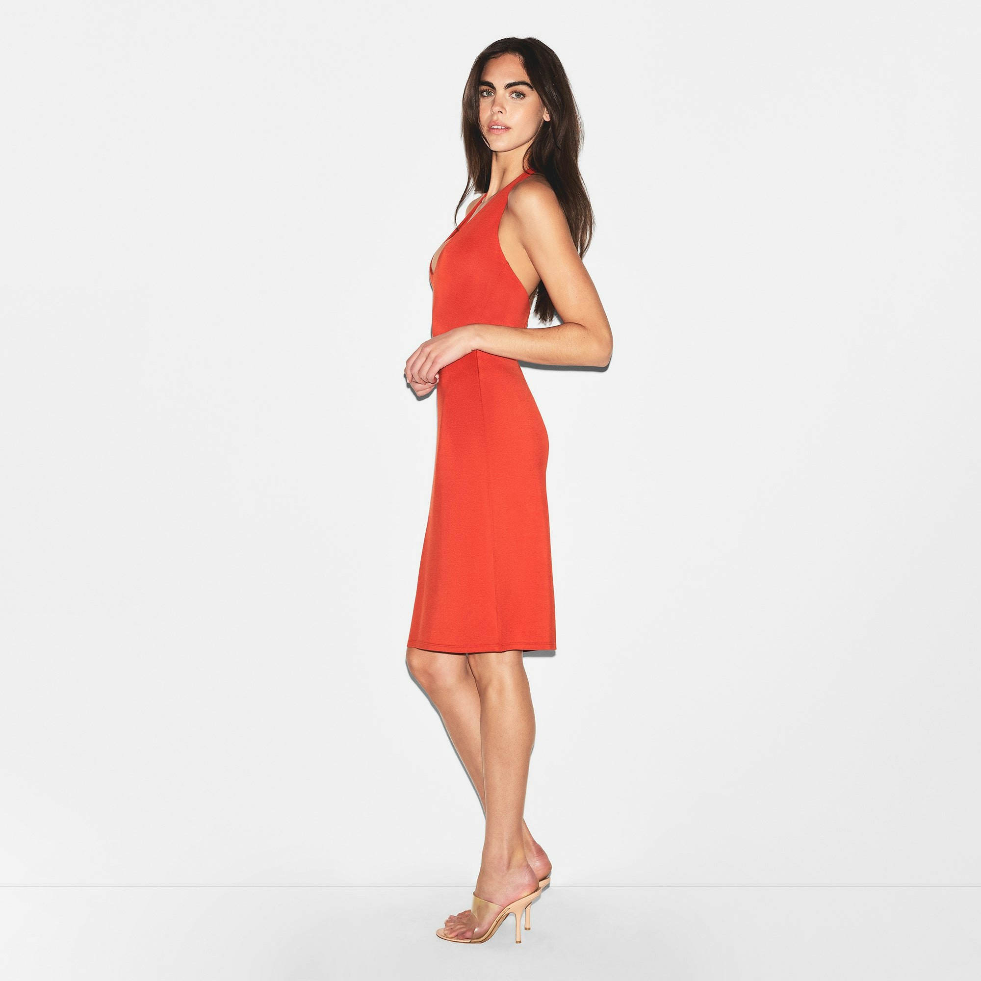 SMOOTH LAYERS HALTER MIDI DRESS | TERRA ON A MODEL SIDE VIEW | FOCUS: 0.0, 1.0, 0.9