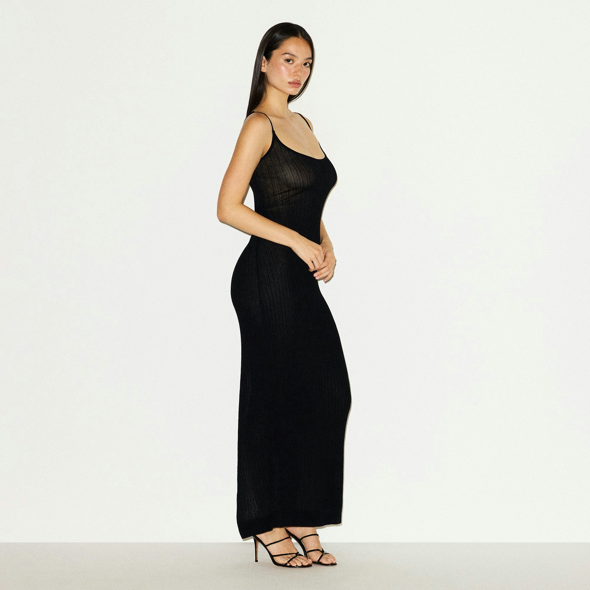 SHEER KNIT LONG CAMI DRESS | ONYX ON A MODEL SIDE VIEW @ | FOCUS: 0.0, 1.0, 0.9