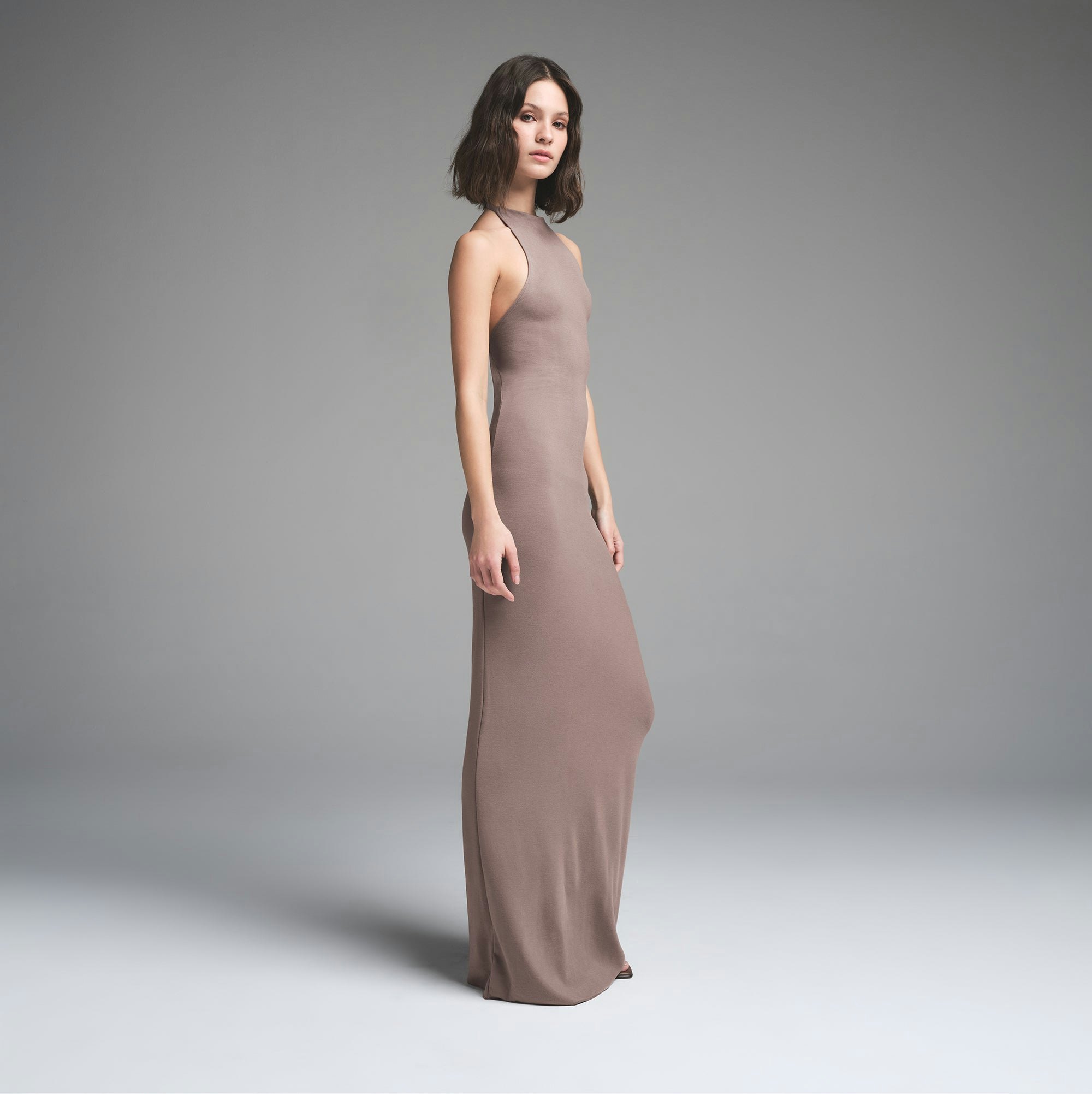 SKIMS CLOUD HALTER LONG DRESS | AMETHYST ON A MODEL SIDE VIEW | FOCUS: 0.0, 1.0, 0.9