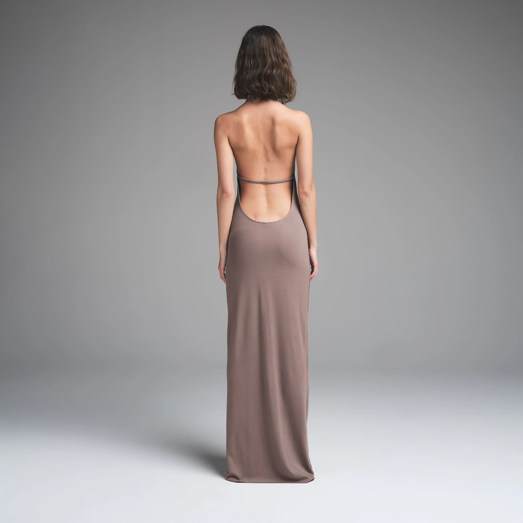 SKIMS CLOUD HALTER LONG DRESS | AMETHYST ON A MODEL BACK VIEW | FOCUS: 0.0, 1.0, 0.9