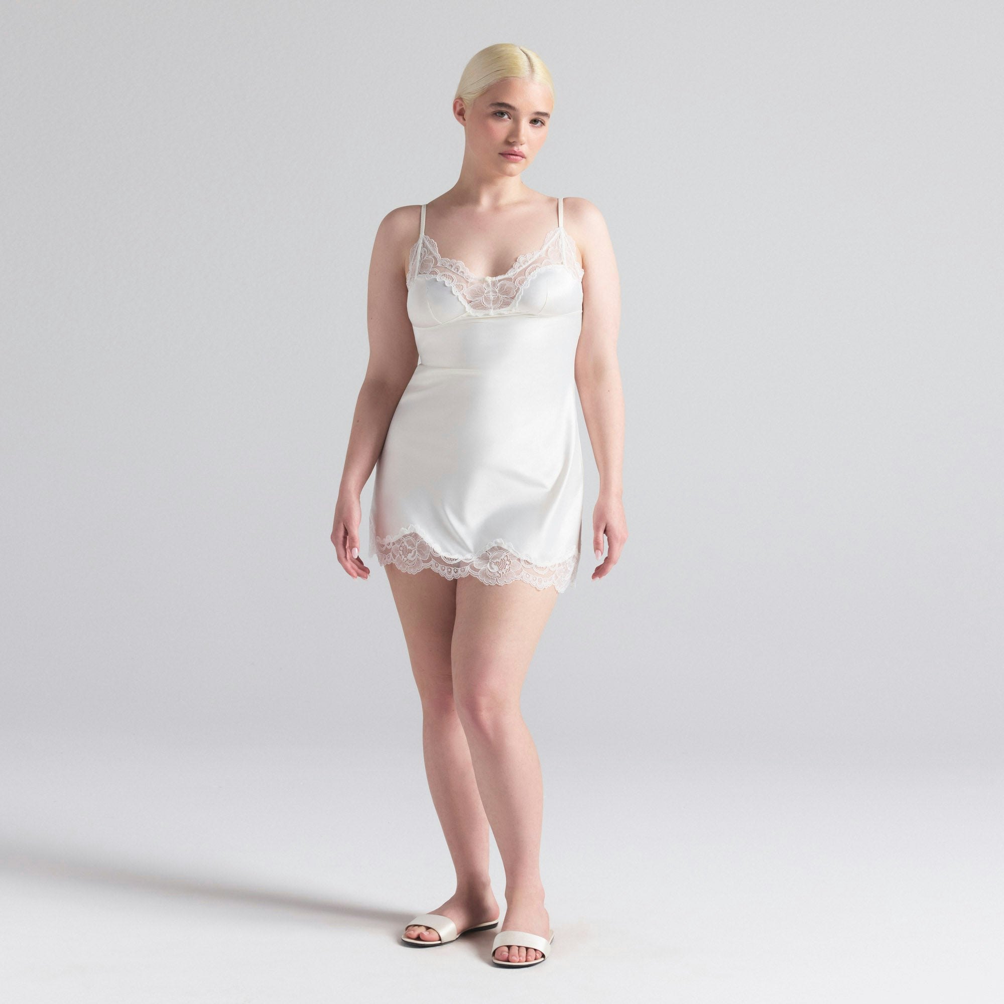 WOVEN SHINE LACE SLIP DRESS | IVORY ON A MODEL FRONT  ON A MODEL FRONT VIEW | FOCUS: 0.0, 1.0, 0.9