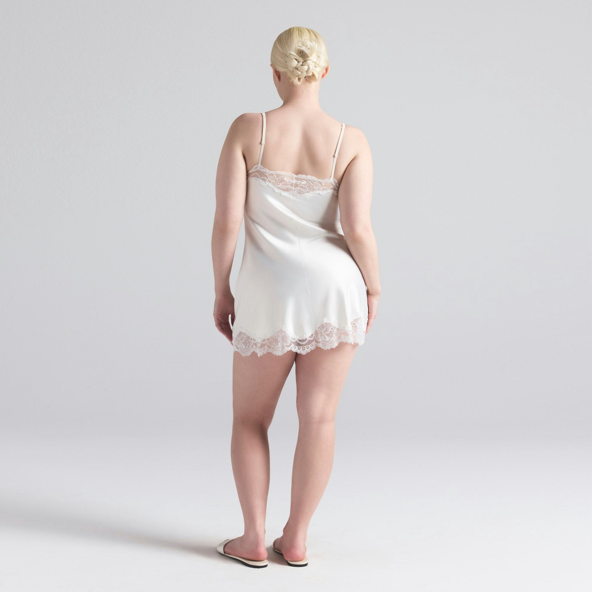 WOVEN SHINE LACE SLIP DRESS | IVORY ON A MODEL SIDE ON A MODEL FRONT VIEW | FOCUS: 0.0, 1.0, 0.9