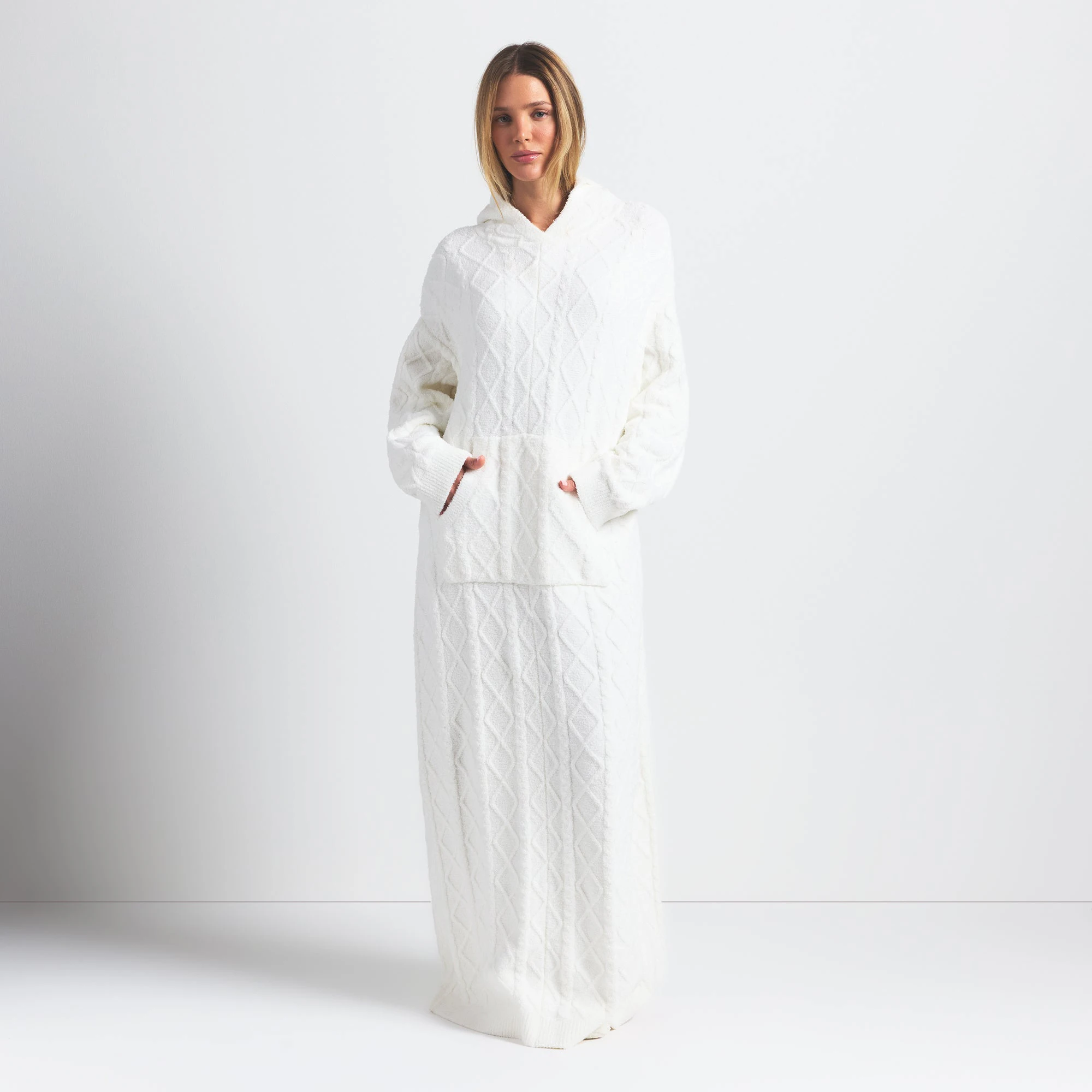 COZY LIGHT OVERSIZED CABLEKNIT LONG DRESS | IVORY ON A MODEL FRONT VIEW @ | FOCUS: 0.0, 1.0, 0.9
