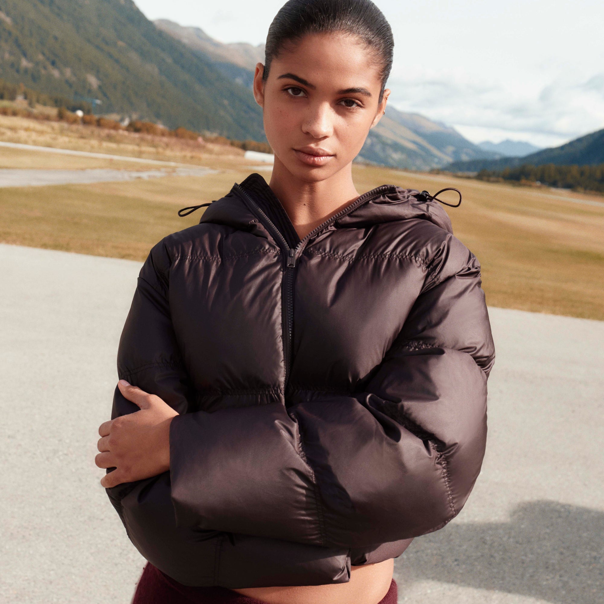 SKIMS PUFFER HOODED JACKET | PHOENIX ON A MODEL FRONT VIEW @ | FOCUS: 0.0, 1.0, 0.9