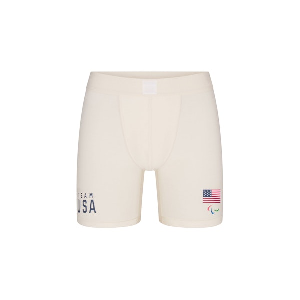 SKIMS FOR TEAM USA SKIMS COTTON MENS PARALYMPIC 5" BOXER BRIEF | ECRU FLAT ON A WHITE BACKGROUND | FLT @ | FOCUS: 0.0, 1.0, 0.9