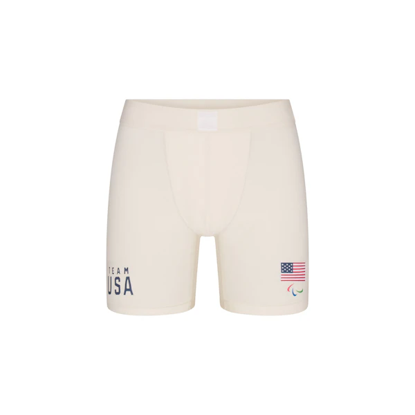 SKIMS FOR TEAM USA SKIMS COTTON MENS PARALYMPIC 5" BOXER BRIEF | ECRU FLAT ON A WHITE BACKGROUND | FLT @ | FOCUS: 0.0, 1.0, 0.9