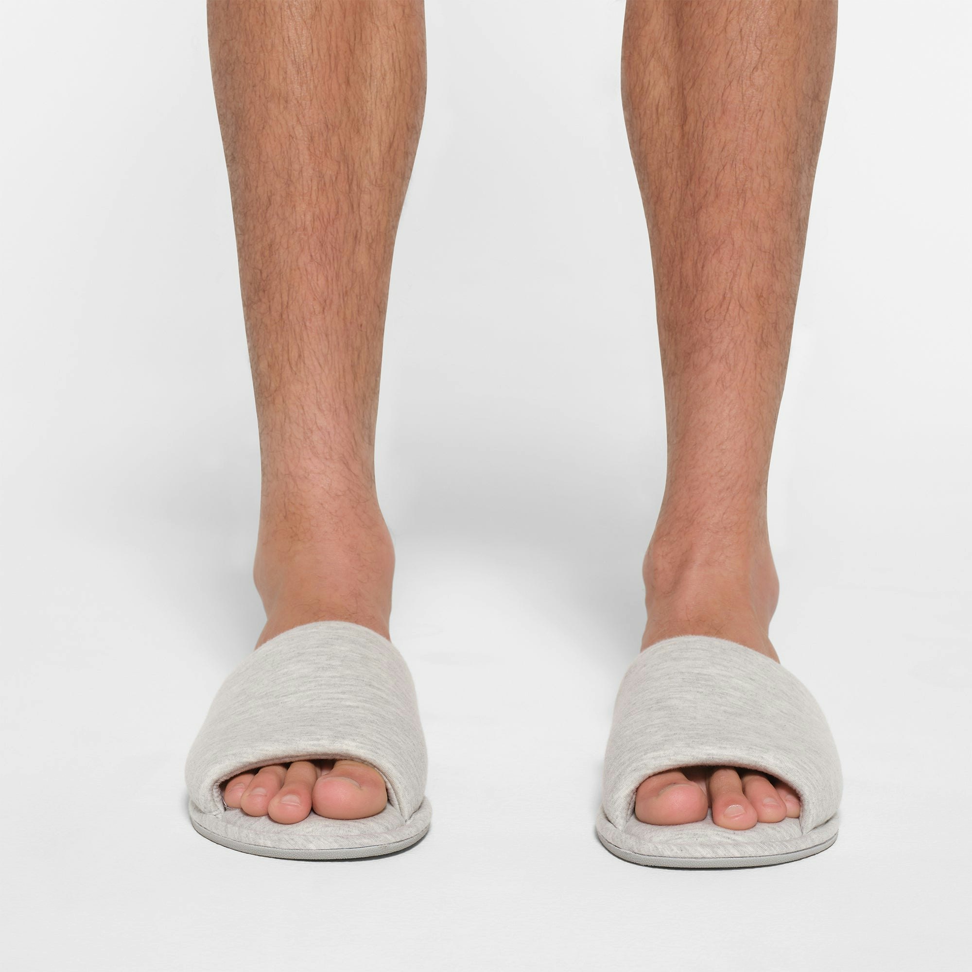 COTTON SLIPPER | LIGHT HEATHER GREY ON A MODEL FRONT VIEW