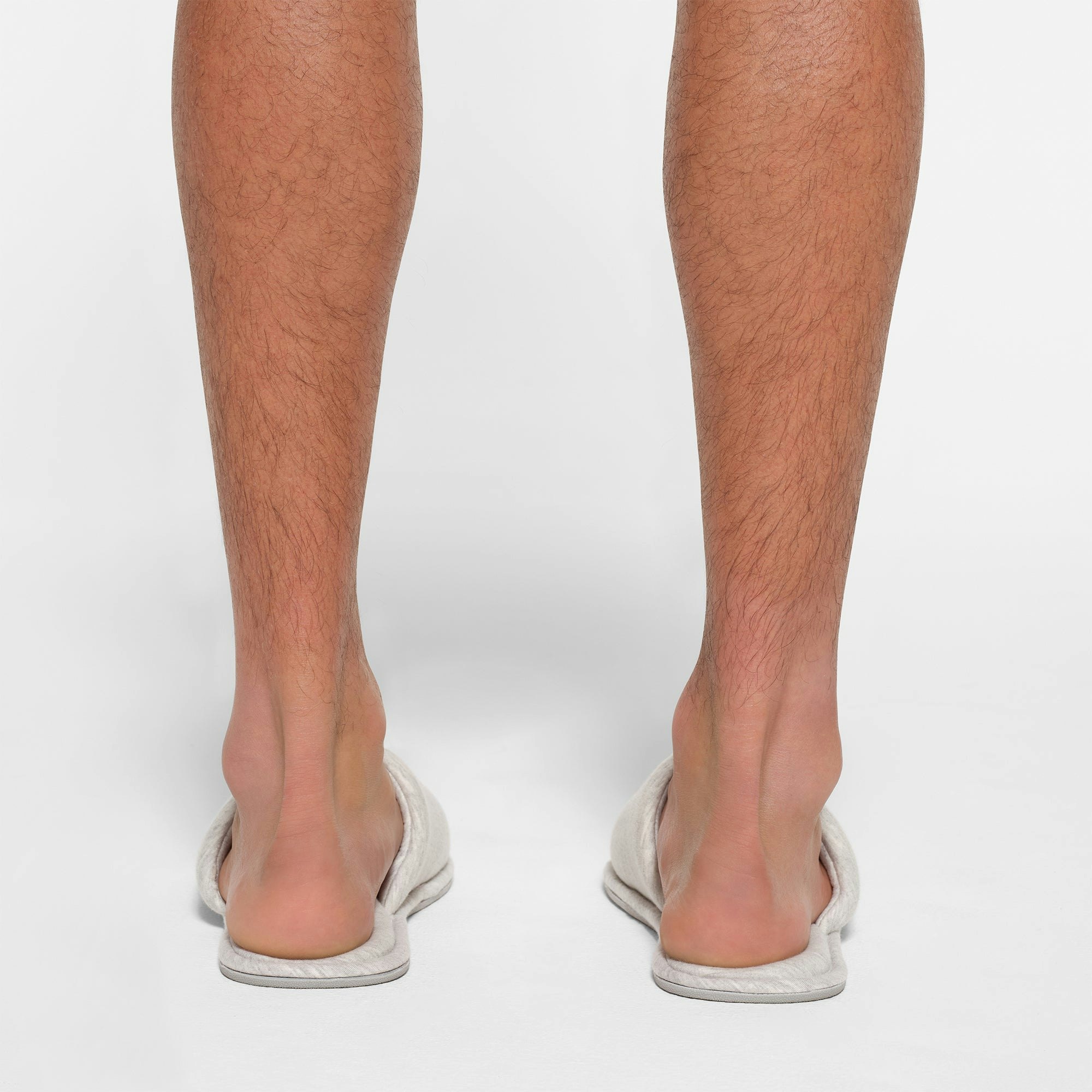 COTTON SLIPPER | LIGHT HEATHER GREY ON A MODEL BACK VIEW