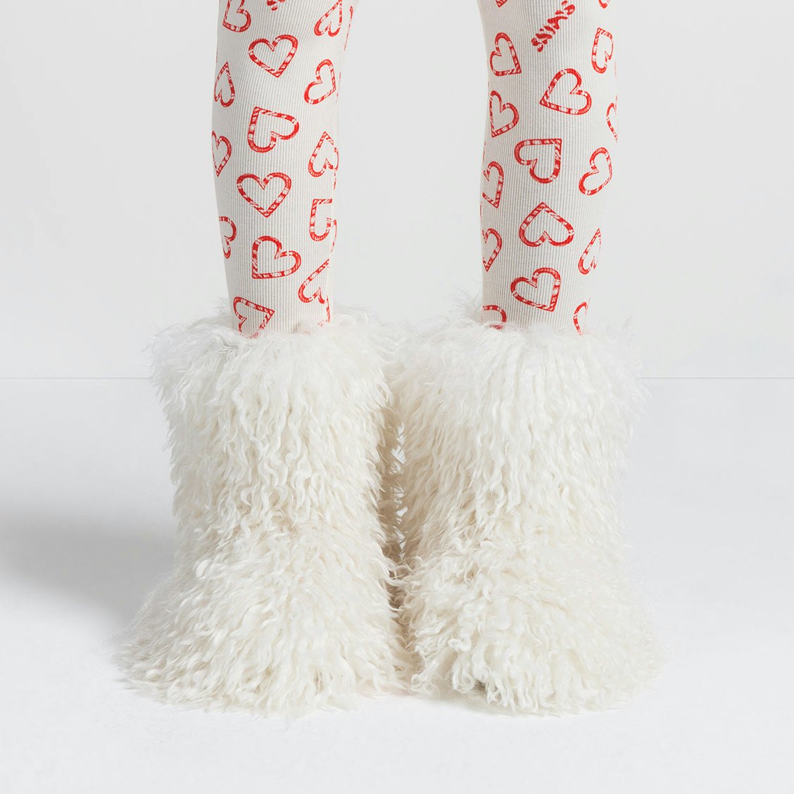 FAUX FUR SHAGGY BOOT | MARBLE ON A MODEL FRONT VIEW