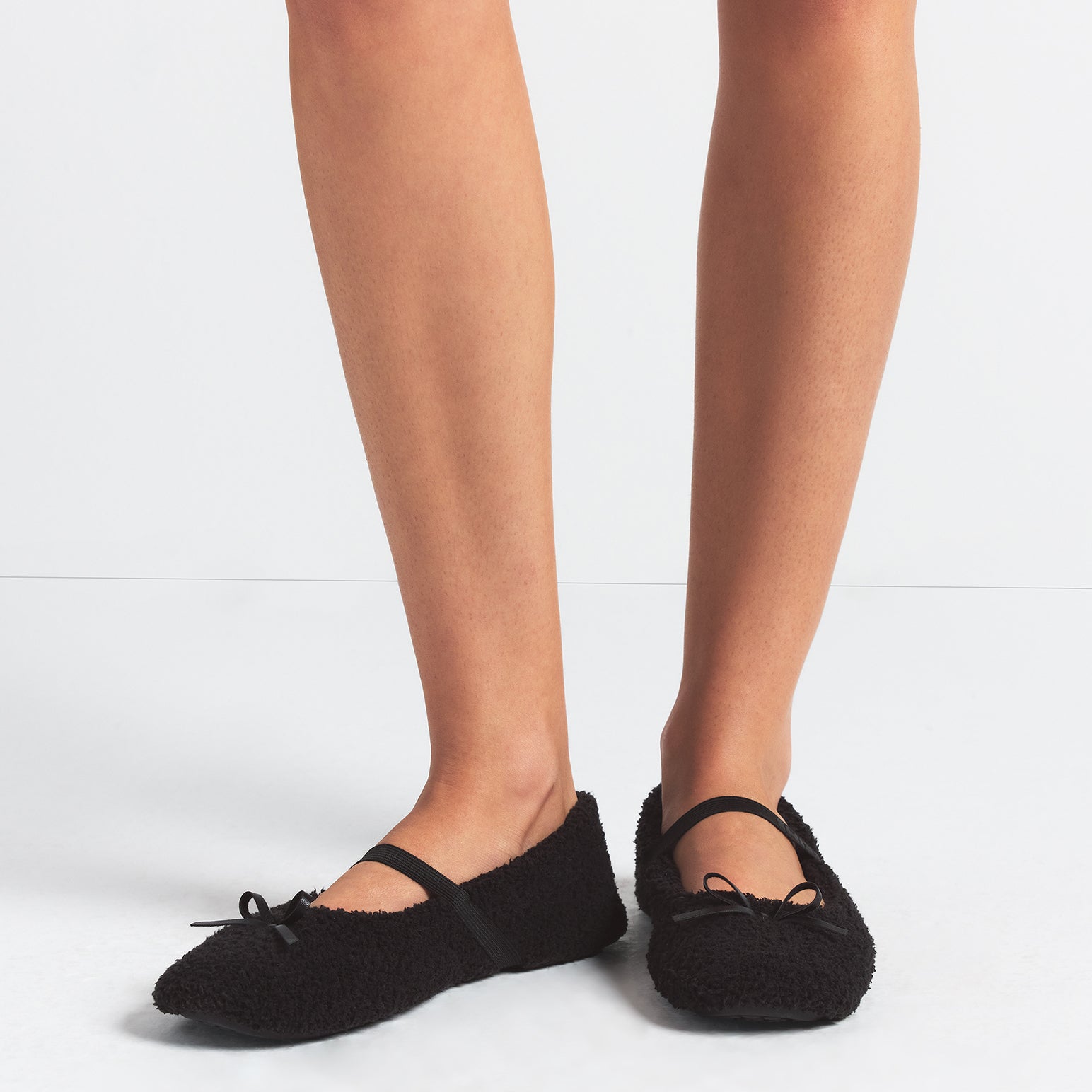 COZY BALLET SLIPPER | ONYX ON A MODEL FRONT VIEW @ | FOCUS: 0.0, 1.0, 0.9