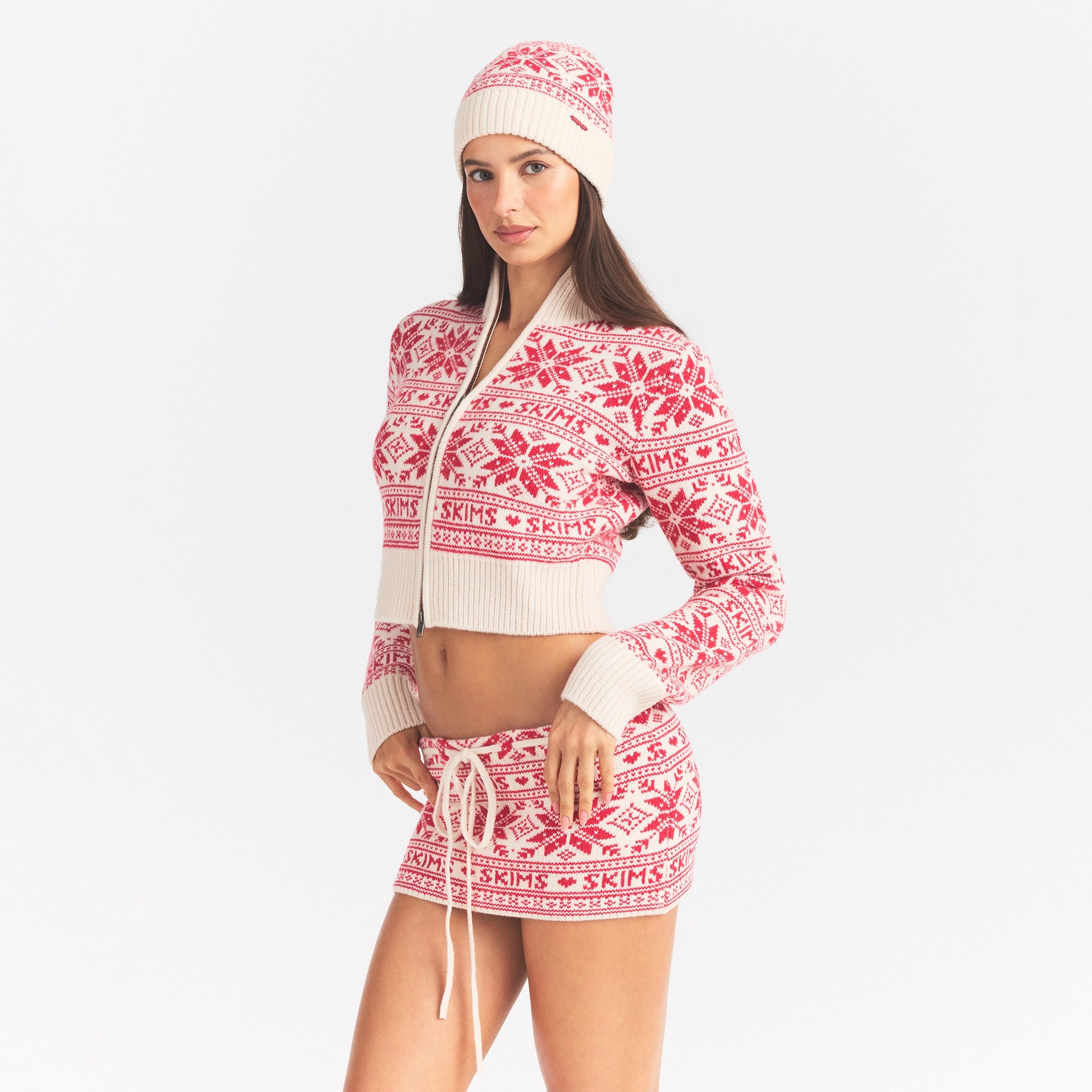 FAIRISLE KNIT BEANIE | SNOW CARDINAL FAIRISLE ON A MODEL SIDE VIEW @ | FOCUS: 0.0, 1.0, 0.9