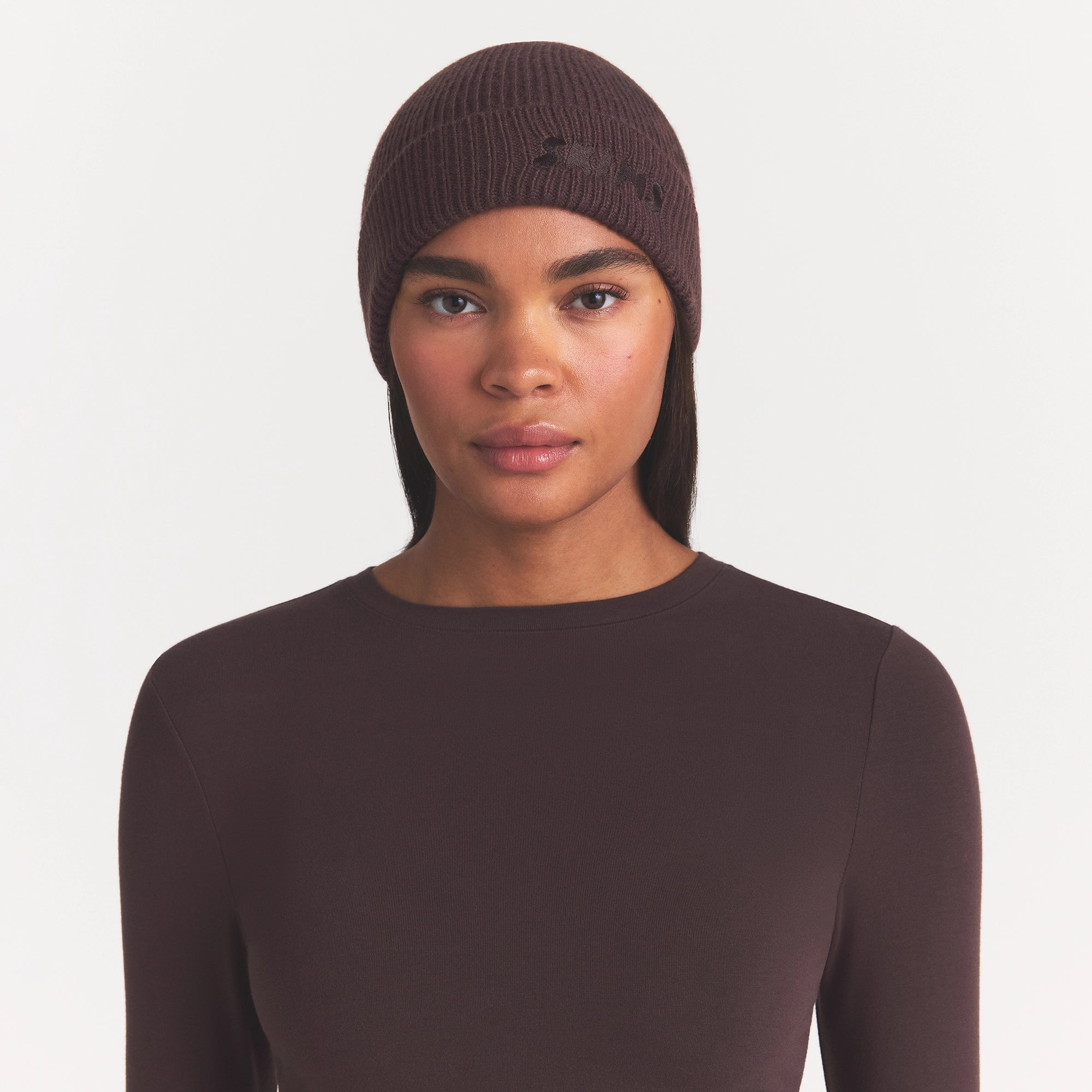 WOOL BLEND KNIT BEANIE | ESPRESSO ON A MODEL FRONT VIEW @ | FOCUS: 0.0, 1.0, 0.9