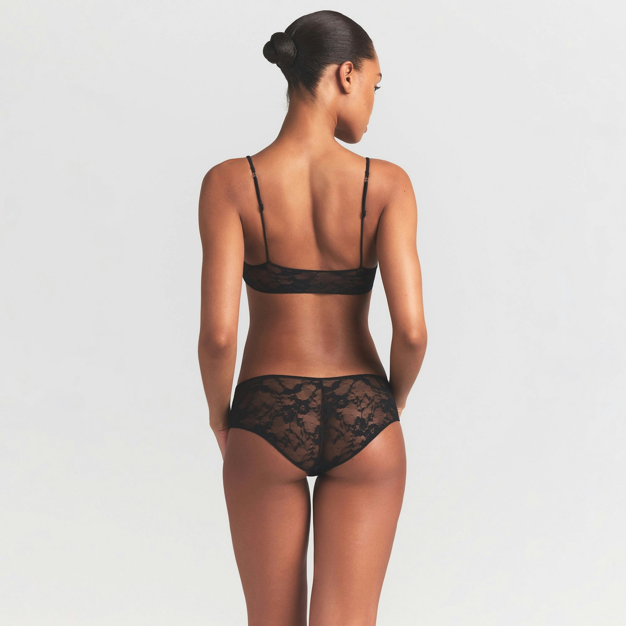 STRETCH LACE LOW RISE HIPSTER | SOOT ON A MODEL SIDE VIEW @ | FOCUS: 0.0, 1.0, 0.9