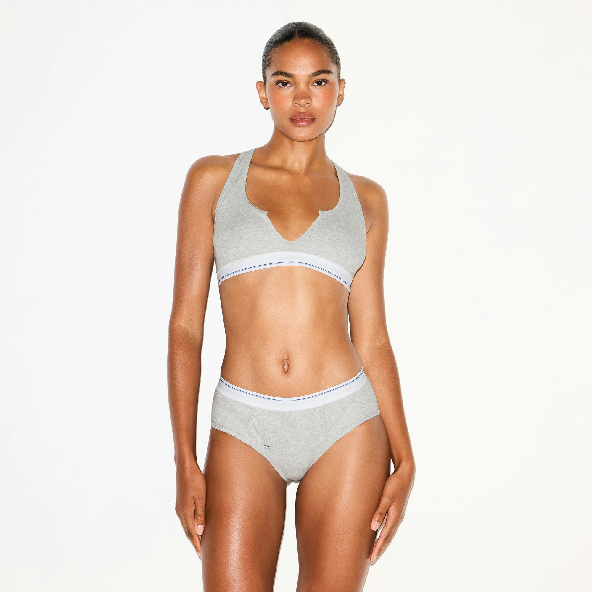 COTTON RIB HIPSTER | LIGHT HEATHER GREY STRIPE ON A MODEL SIDE VIEW @ | FOCUS: 0.0, 1.0, 0.9