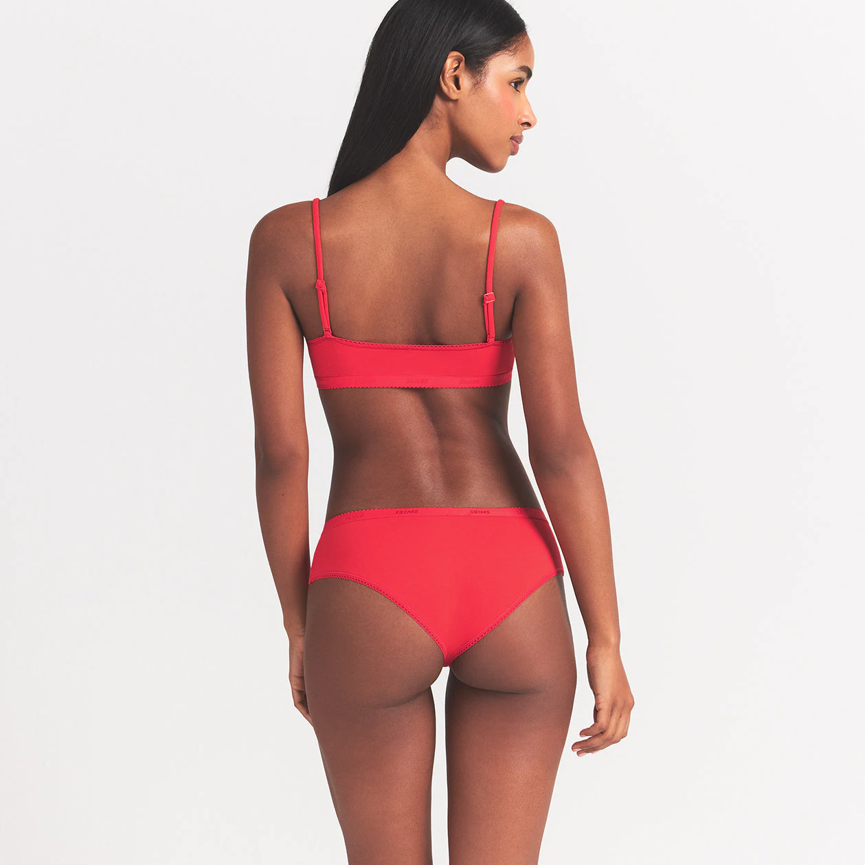 LIGHTWEIGHT COTTON LOGO PICOT HIPSTER | RUBY TONAL ON A MODEL BACK VIEW @ | FOCUS: 0.0, 1.0, 0.9