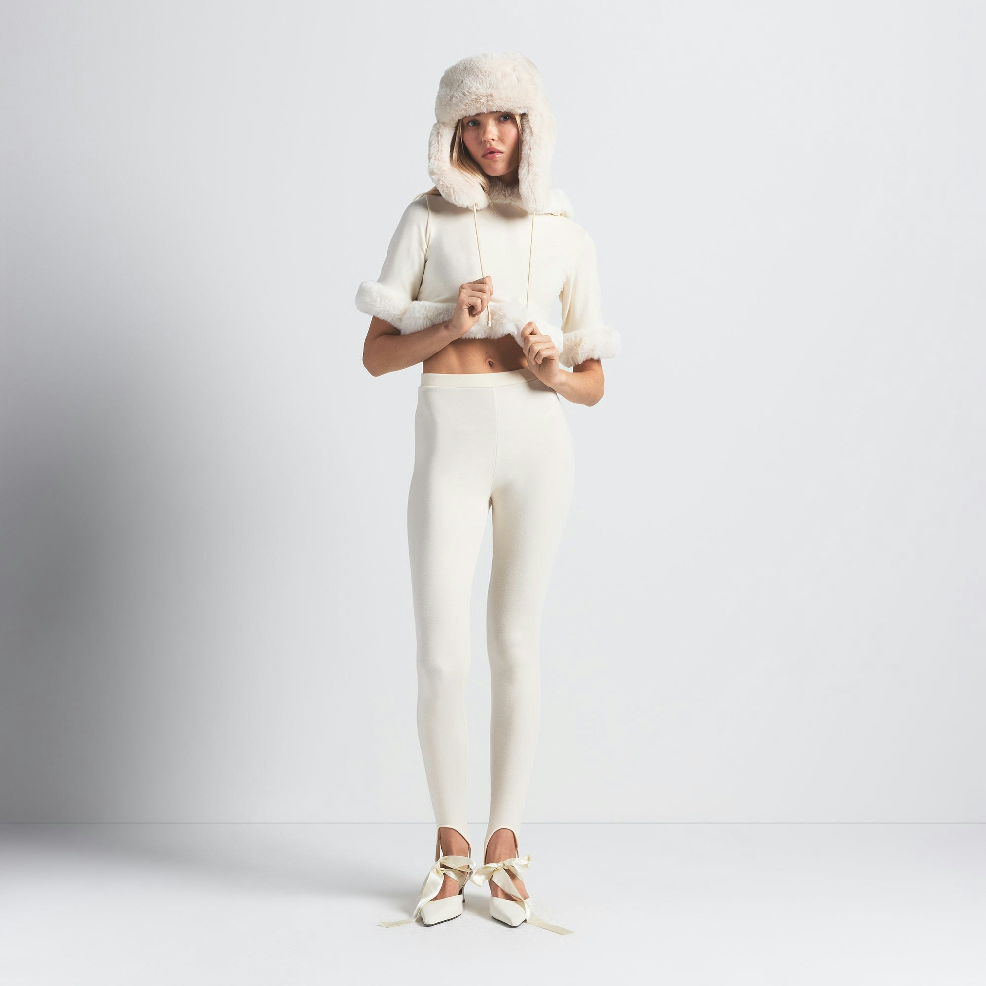 FAUX FUR TRAPPER HAT | EGRET ON A MODEL FRONT VIEW @ | FOCUS: 0.0, 1.0, 0.9