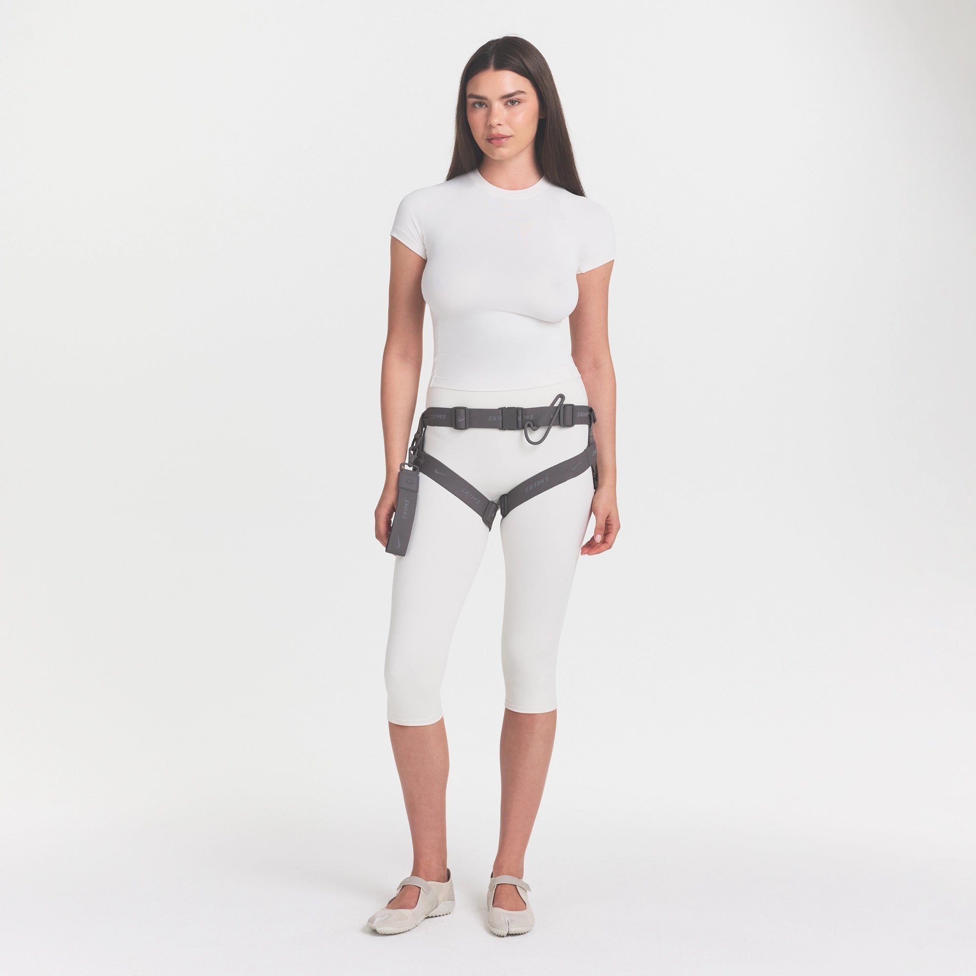 NikeSKIMS MATTE PADDED BABY TEE | IVORY ON A MODEL 
