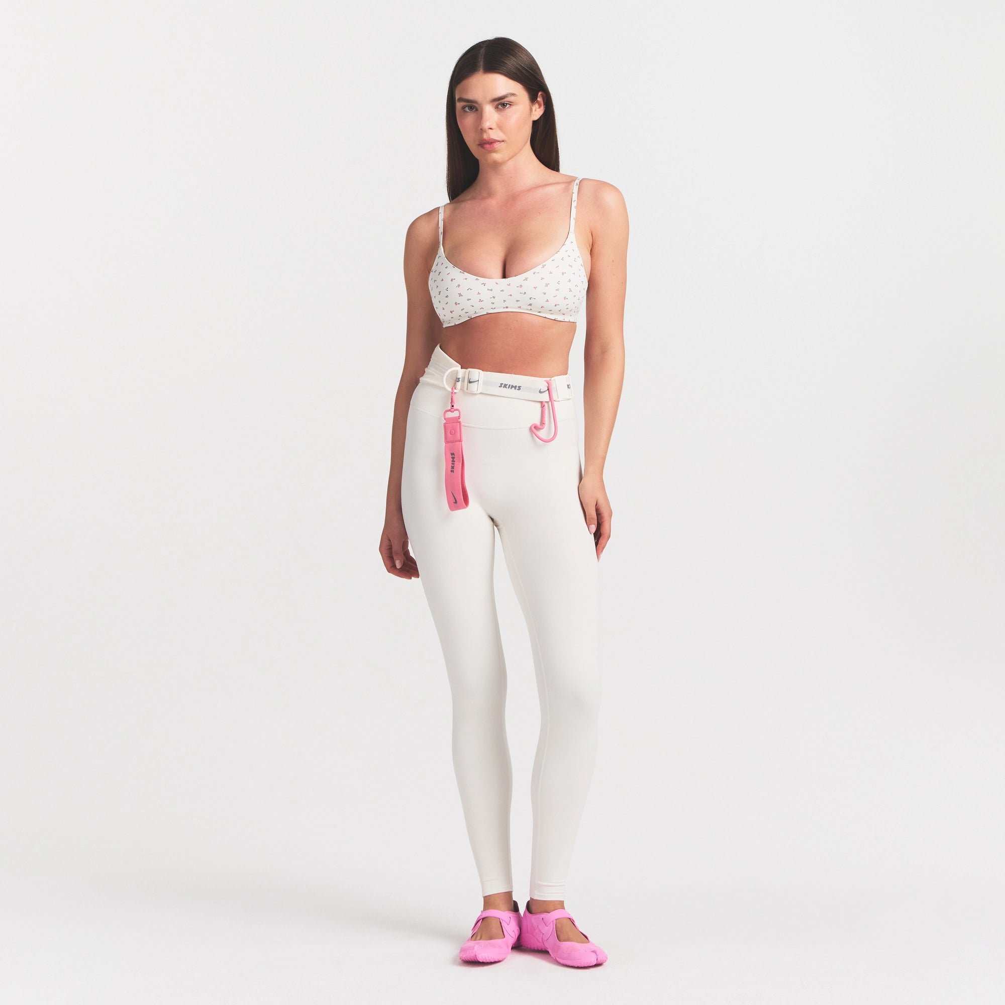 NikeSKIMS MATTE 26" LEGGING | IVORY ON A MODEL VIEW @ | FOCUS: 0.0, 1.0, 0.9