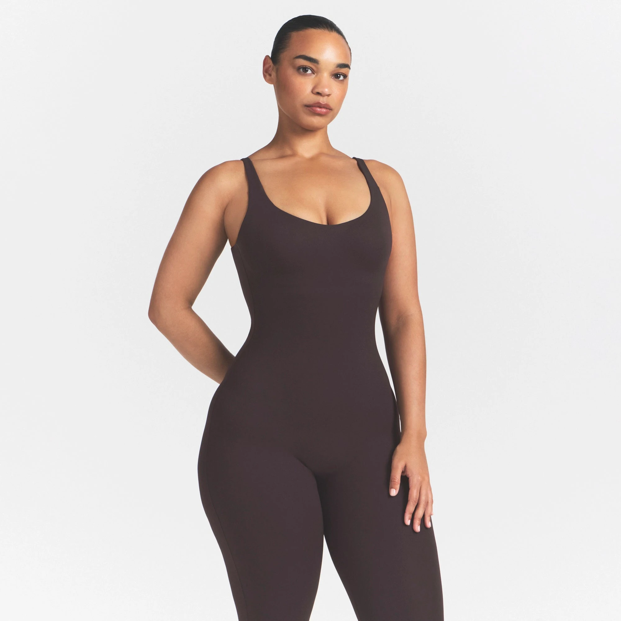 NikeSKIMS STUDIO STRETCH LONG 29" ONE PIECE | DARK ROASTON A MODEL FRONT