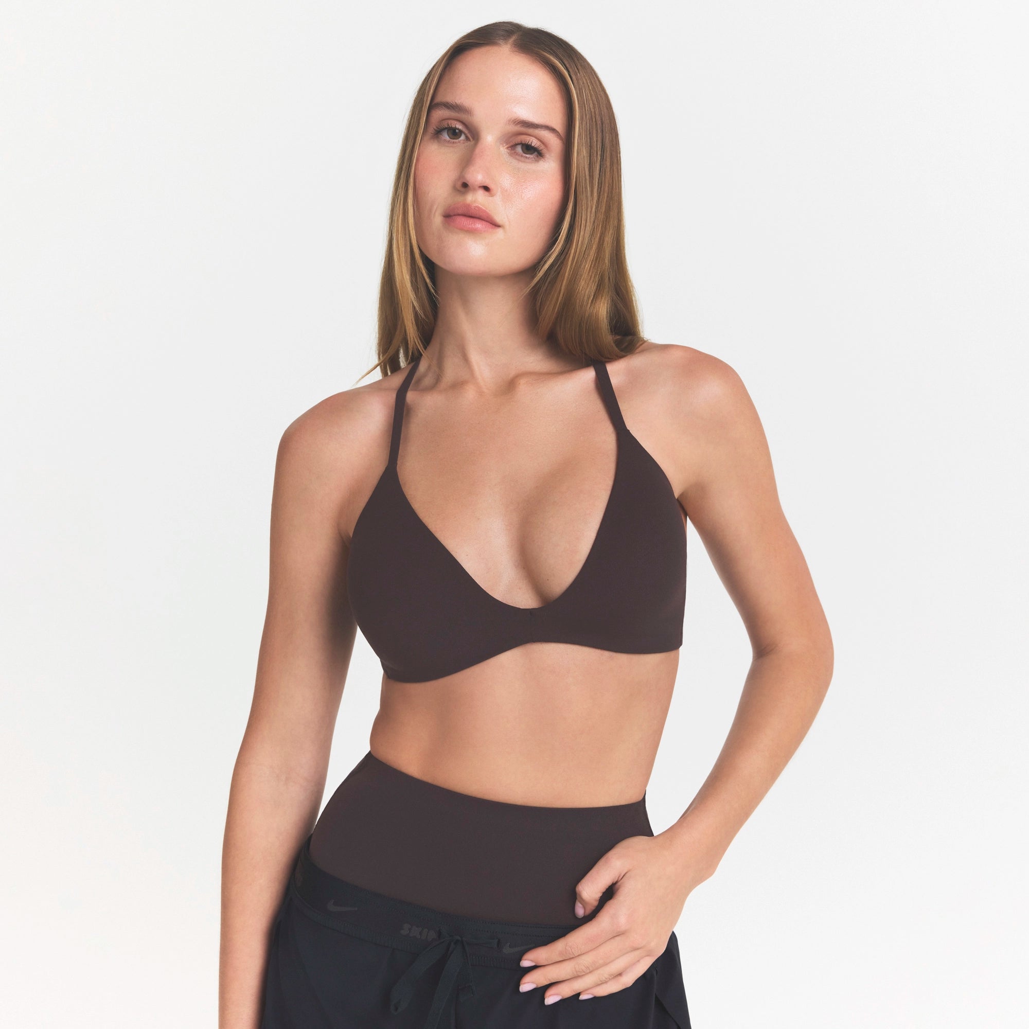 NikeSKIMS STUDIO STRETCH T-BACK TRIANGLE BRA | DARK ROASTON A MODEL FRONT 