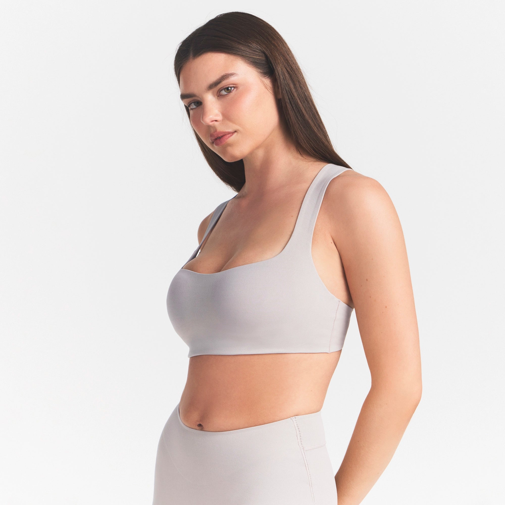 NikeSKIMS STUDIO STRETCH SQUARE NECK RACER BRA | LINENON A MODEL FRONT 