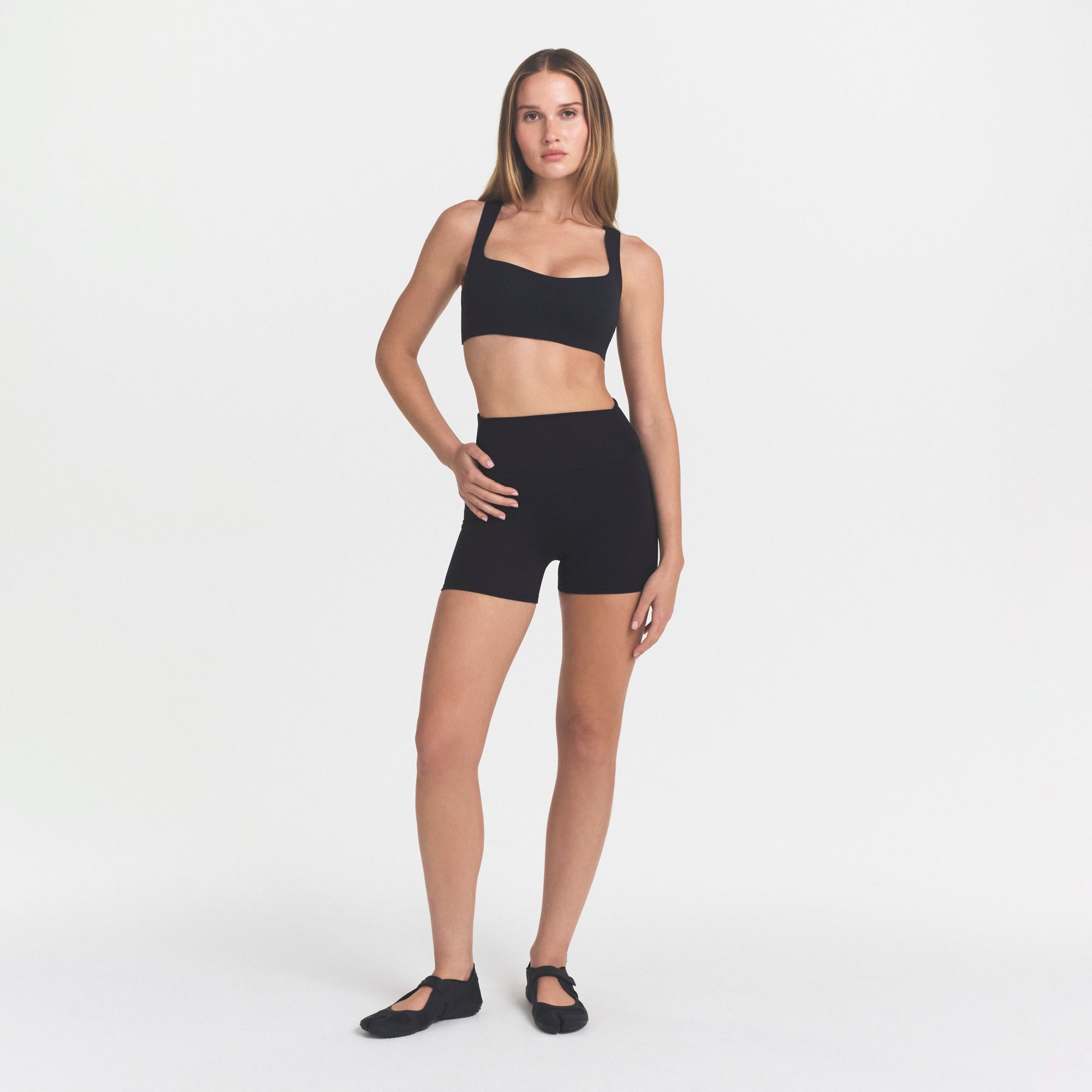 NikeSKIMS STUDIO STRETCH SQUARE NECK RACER BRA | OBSIDIANON A MODEL FRONT 