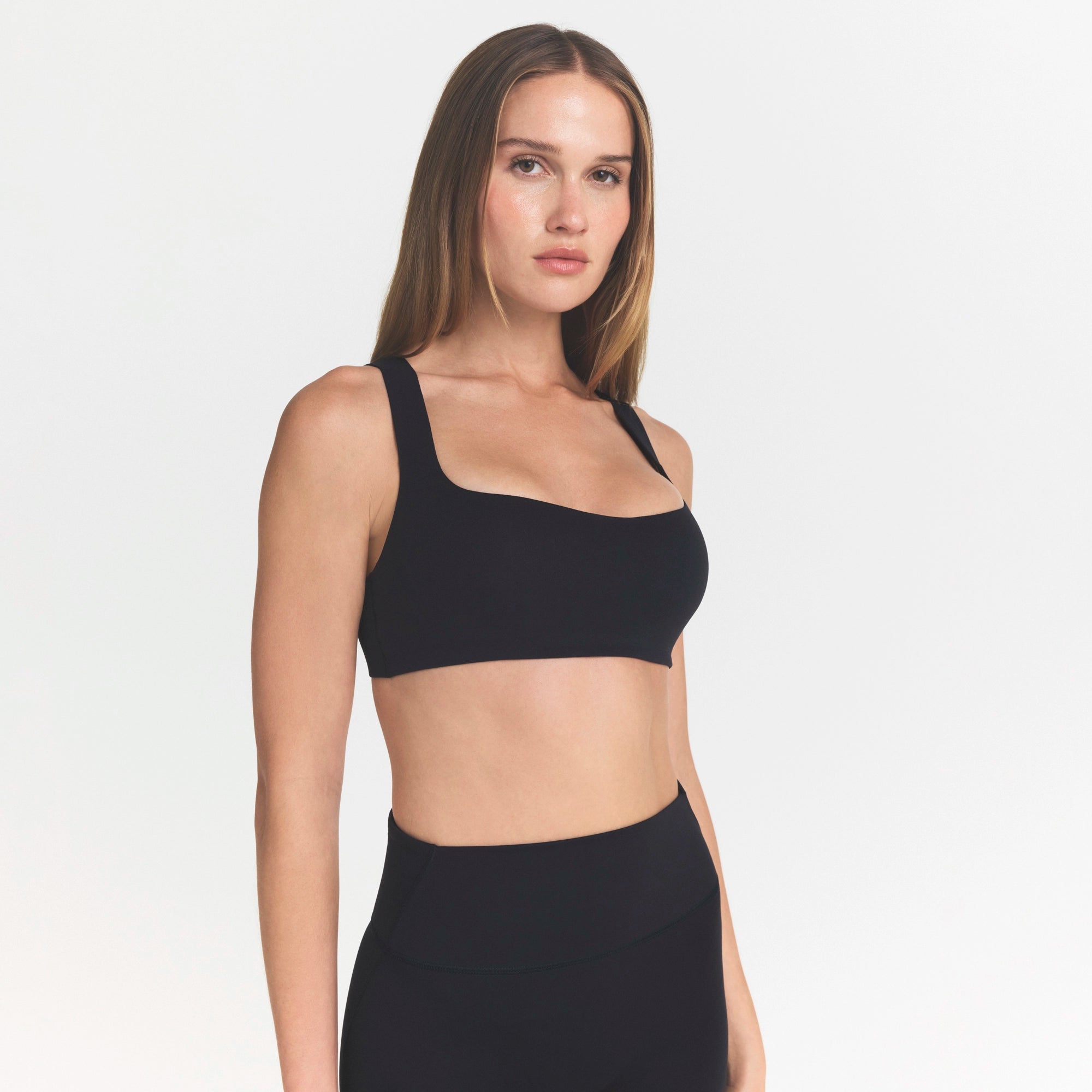 NikeSKIMS STUDIO STRETCH SQUARE NECK RACER BRA | OBSIDIANON A MODEL FRONT 